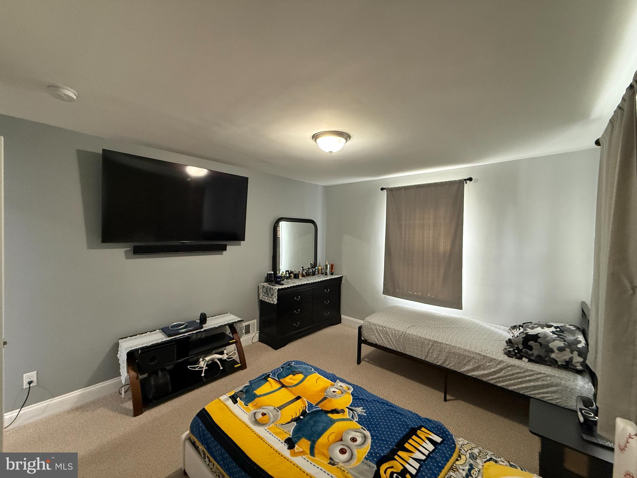 3499 Hillsmere Road Baltimore, MD 21207 - Photo 20 of 50 Cozy bedroom with modern amenities.