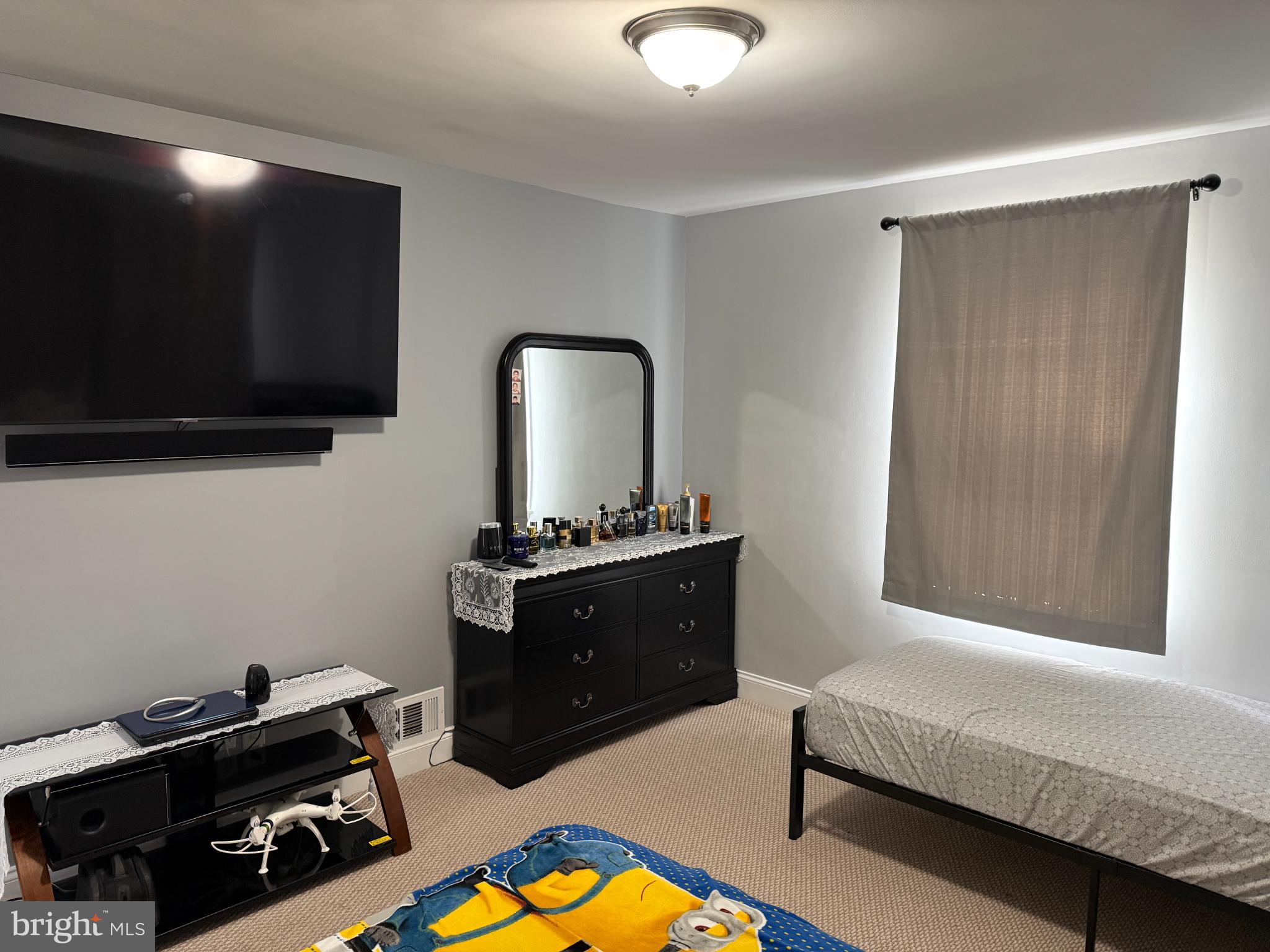 3499 Hillsmere Road Baltimore, MD 21207 - Photo 21 of 50 Cozy bedroom with modern amenities.