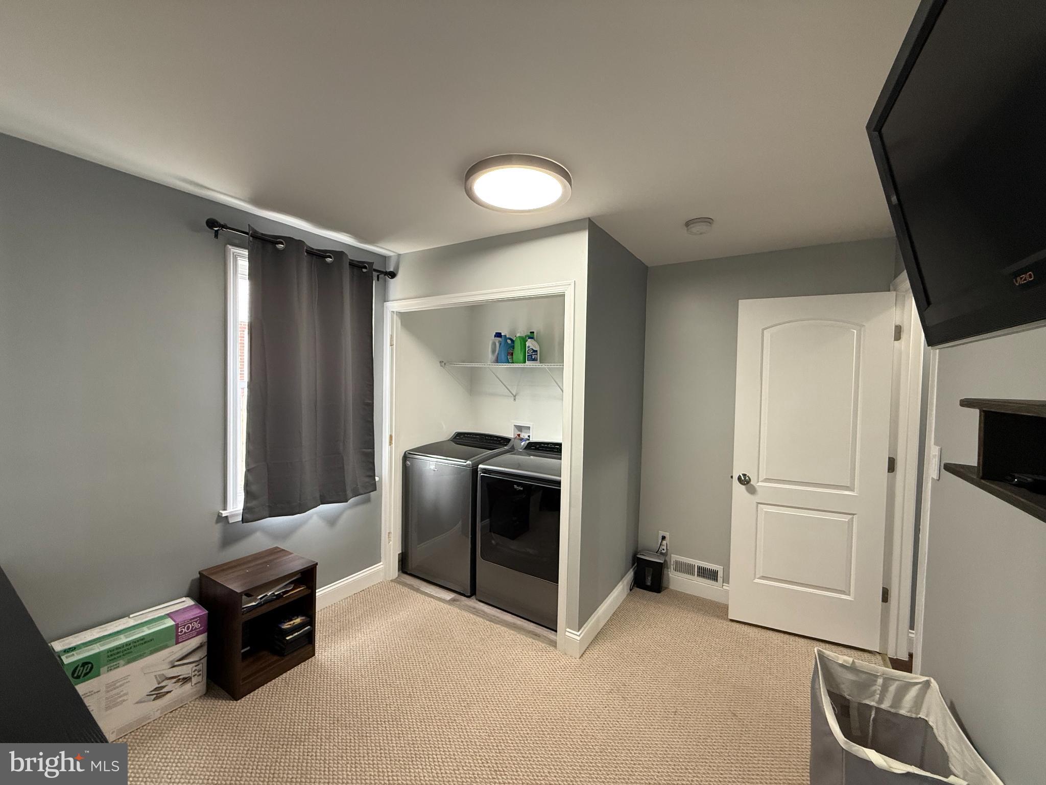3499 Hillsmere Road Baltimore, MD 21207 - Photo 25 of 50 Bright and functional laundry space.