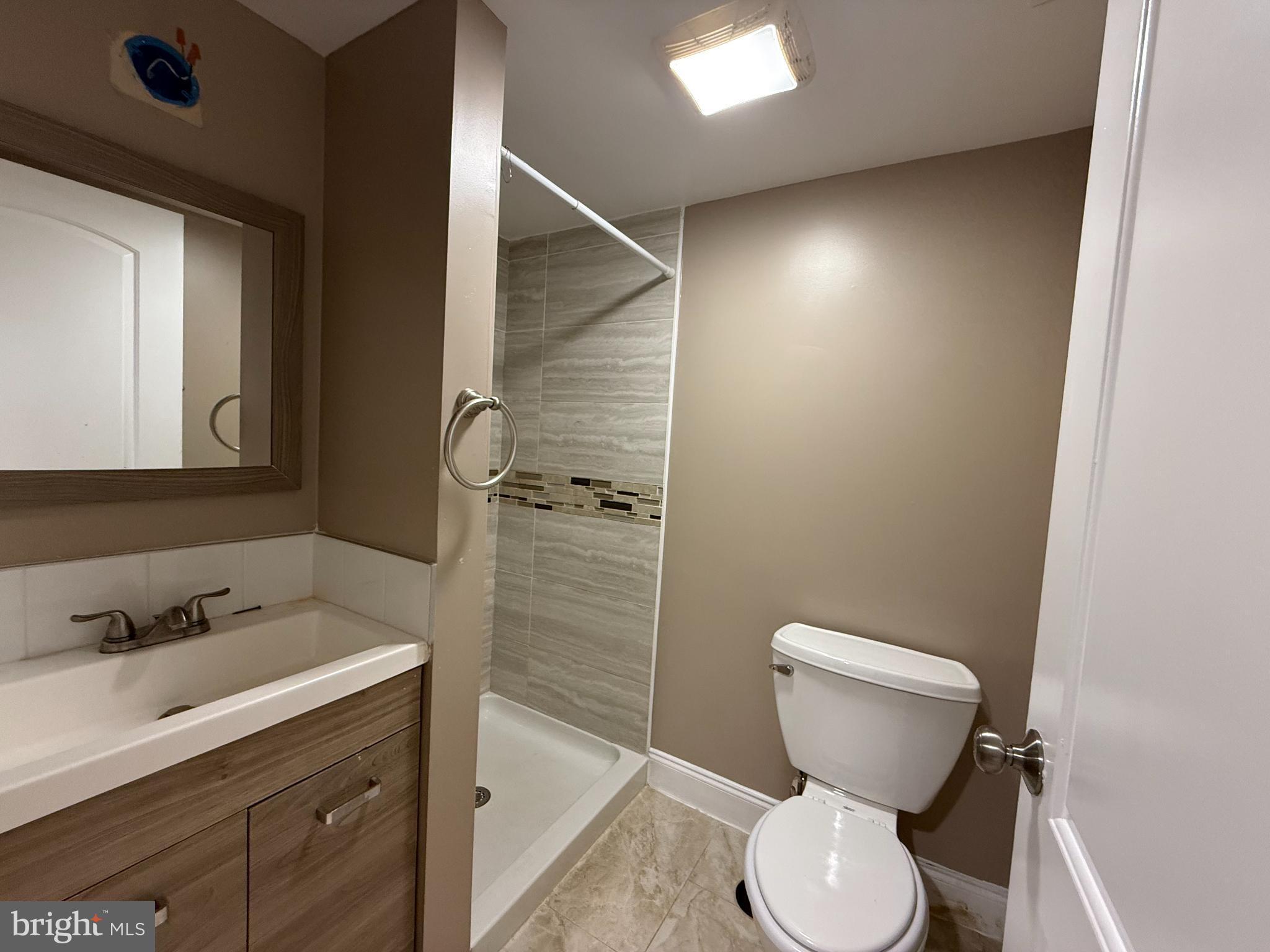 3499 Hillsmere Road Baltimore, MD 21207 - Photo 30 of 50 Modern bathroom with sleek finishes.