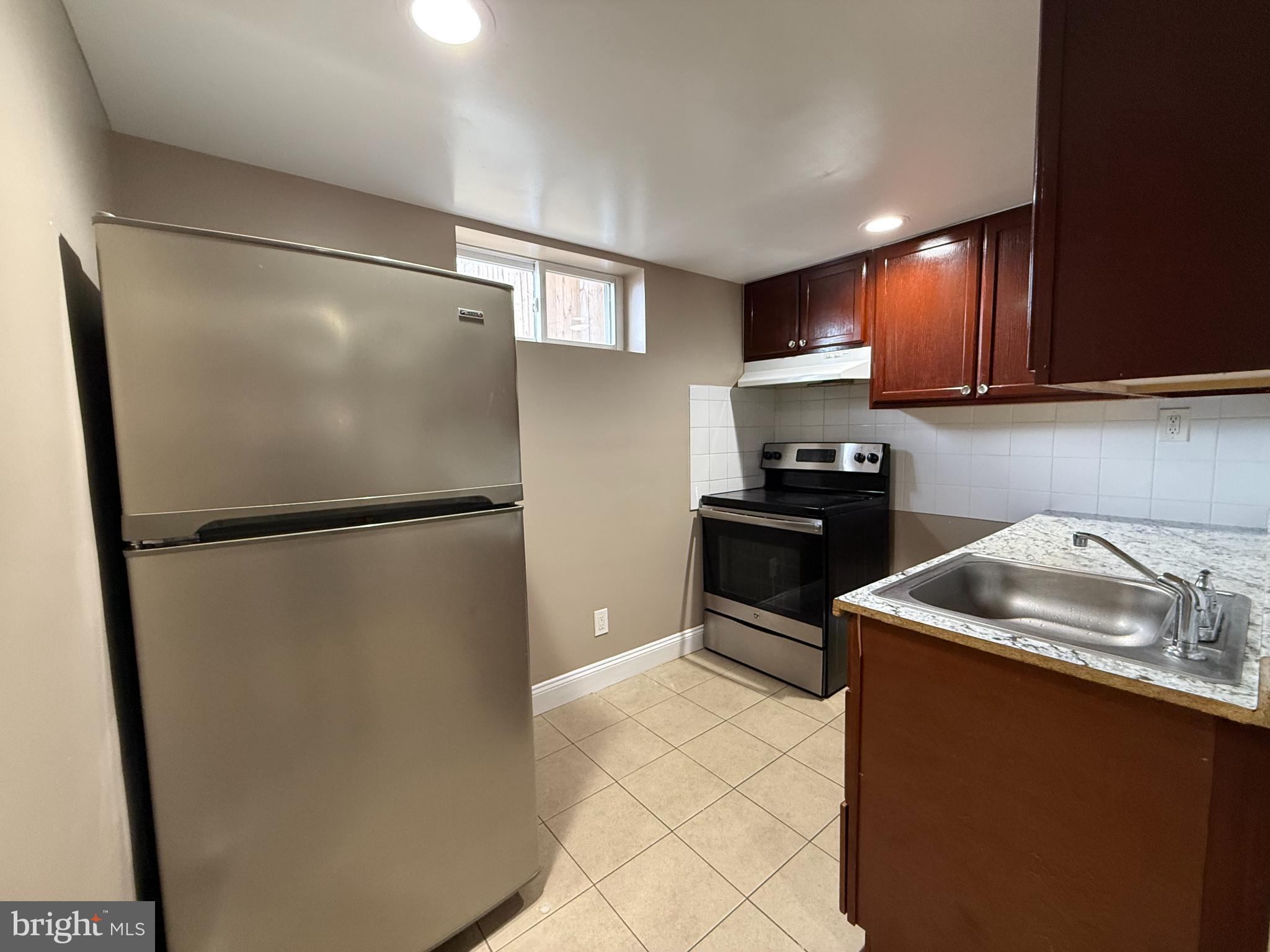 3499 Hillsmere Road Baltimore, MD 21207 - Photo 32 of 50 Modern kitchen with sleek appliances.