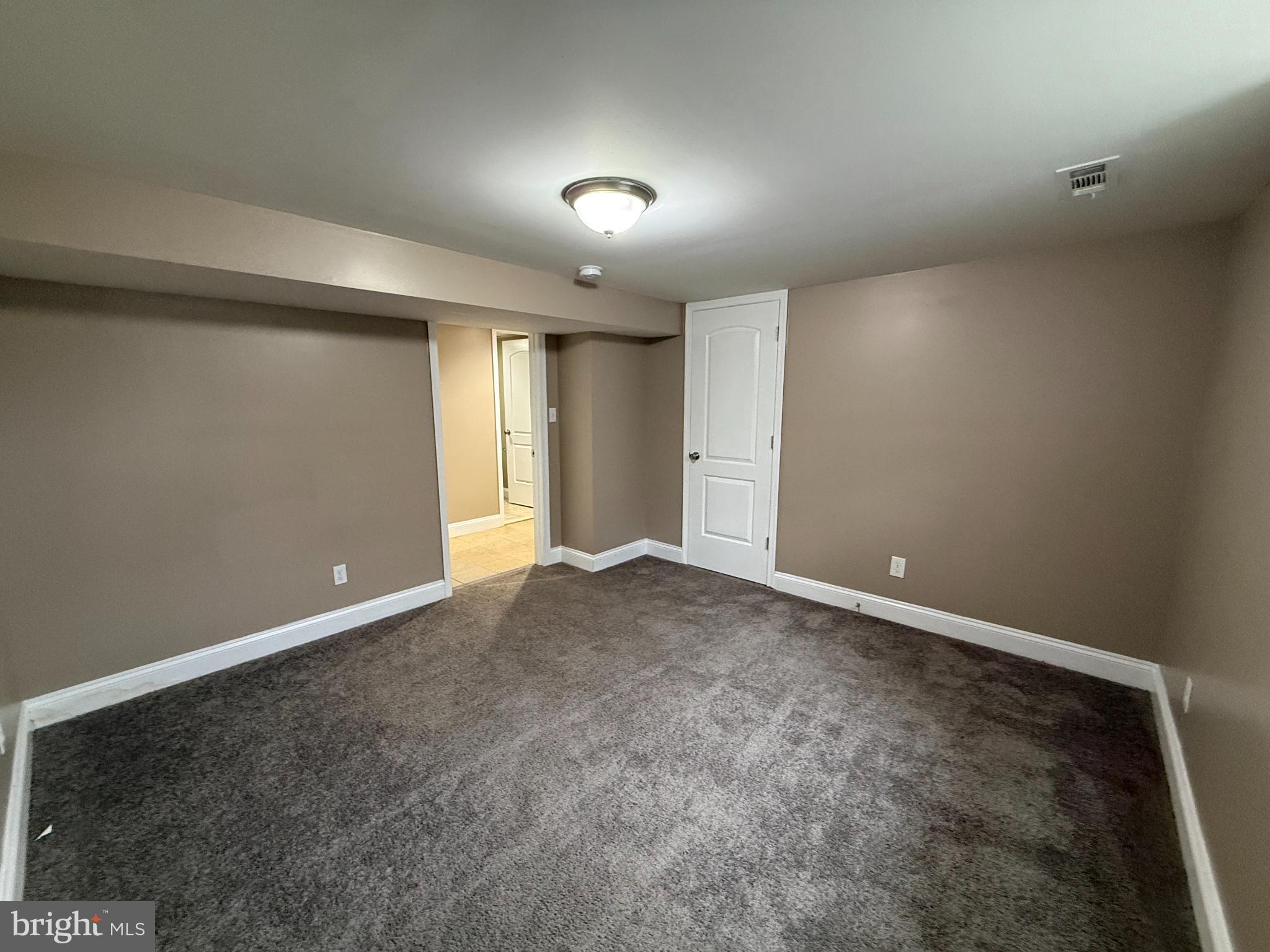 3499 Hillsmere Road Baltimore, MD 21207 - Photo 35 of 50 Spacious, versatile room with neutral tones.