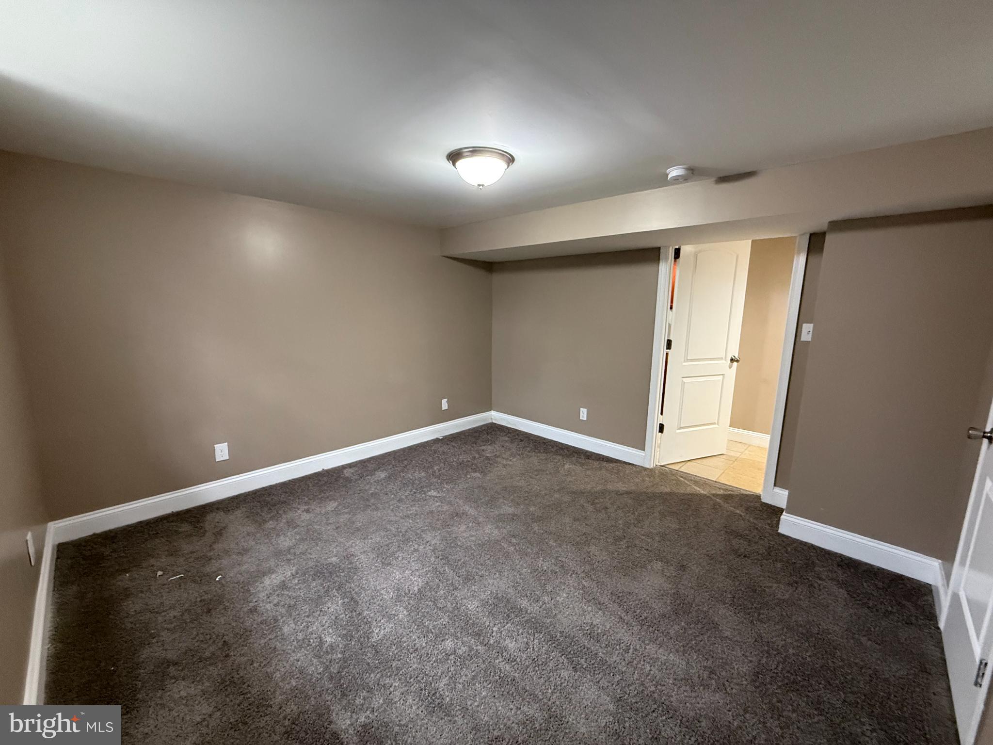3499 Hillsmere Road Baltimore, MD 21207 - Photo 37 of 50 Spacious, versatile room with neutral tones.