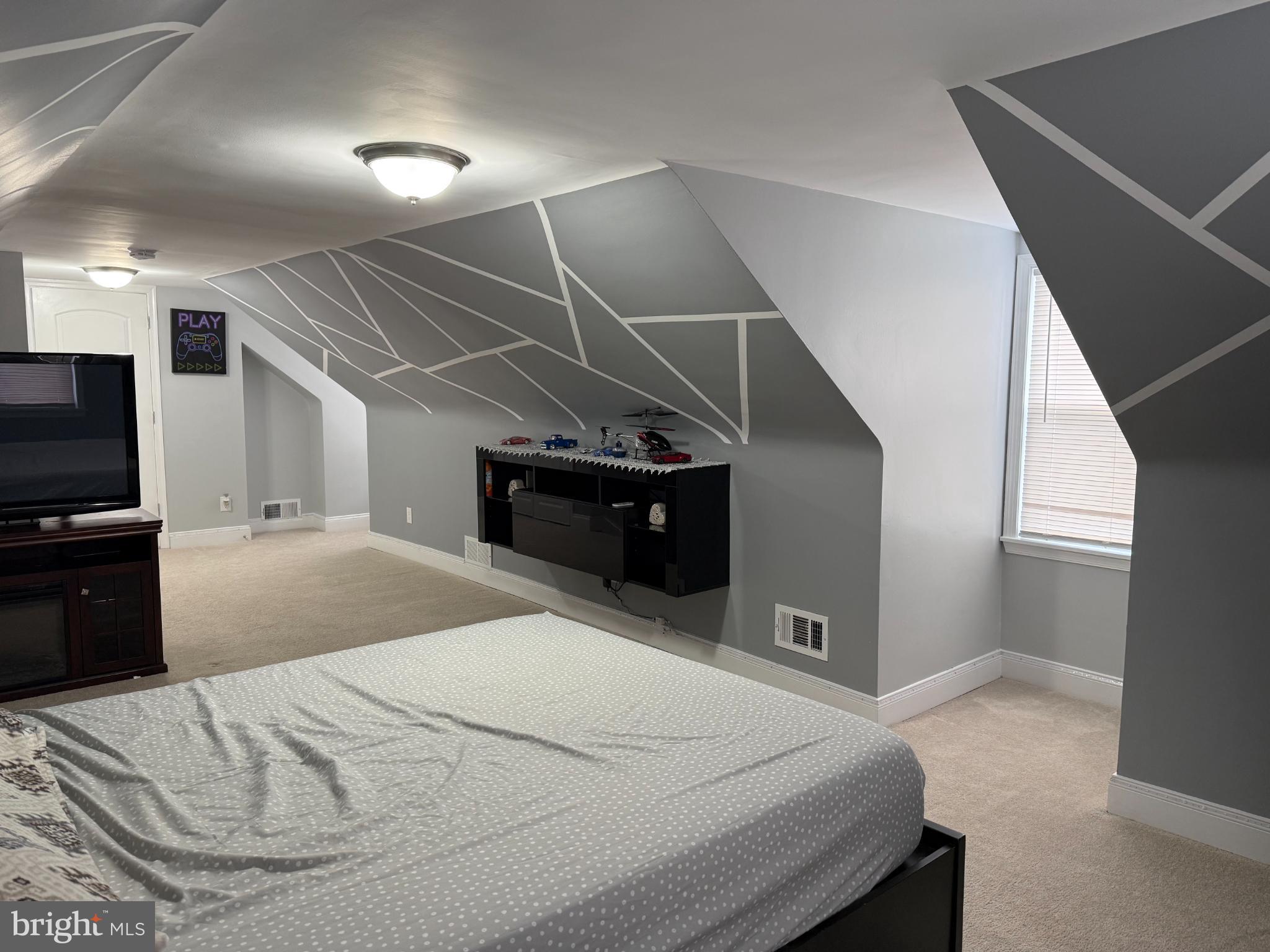 3499 Hillsmere Road Baltimore, MD 21207 - Photo 39 of 50 Stylish attic retreat with modern flair.