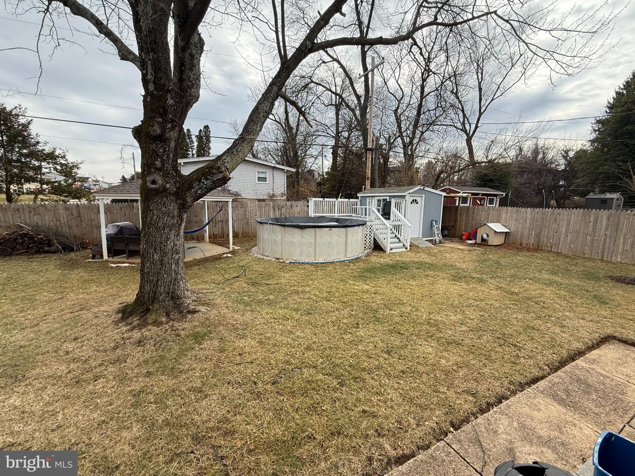 3499 Hillsmere Road Baltimore, MD 21207 - Photo 45 of 50 Spacious backyard with pool and cozy shed.