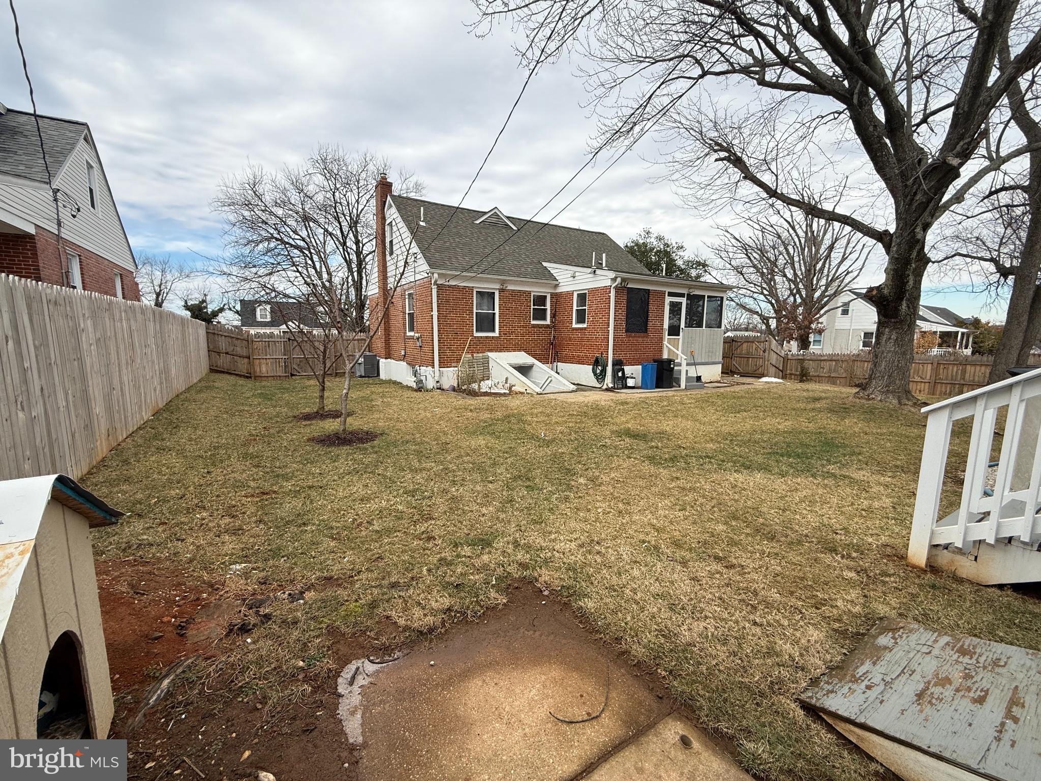 3499 Hillsmere Road Baltimore, MD 21207 - Photo 47 of 50 Spacious backyard with charming home backdrop.