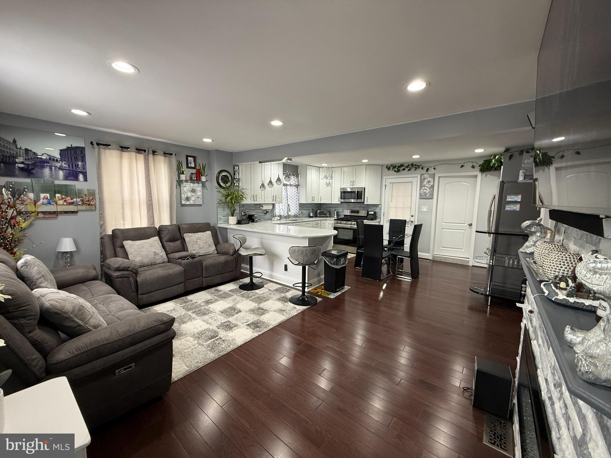 3499 Hillsmere Road Baltimore, MD 21207 - Photo 10 of 50 Modern open-concept living space with elegance.