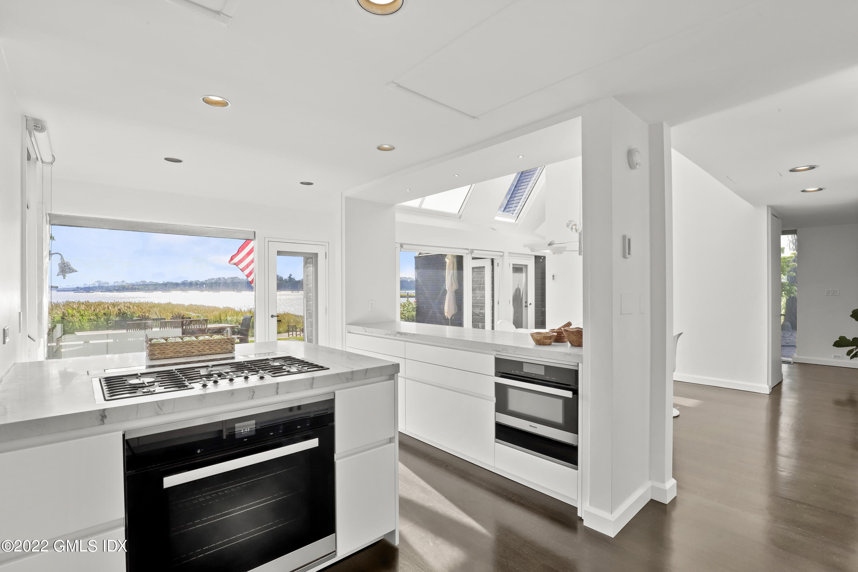 46 Carriglea Drive Riverside, CT 06878 - Photo 19 of 41 a kitchen with a stove and a microwave