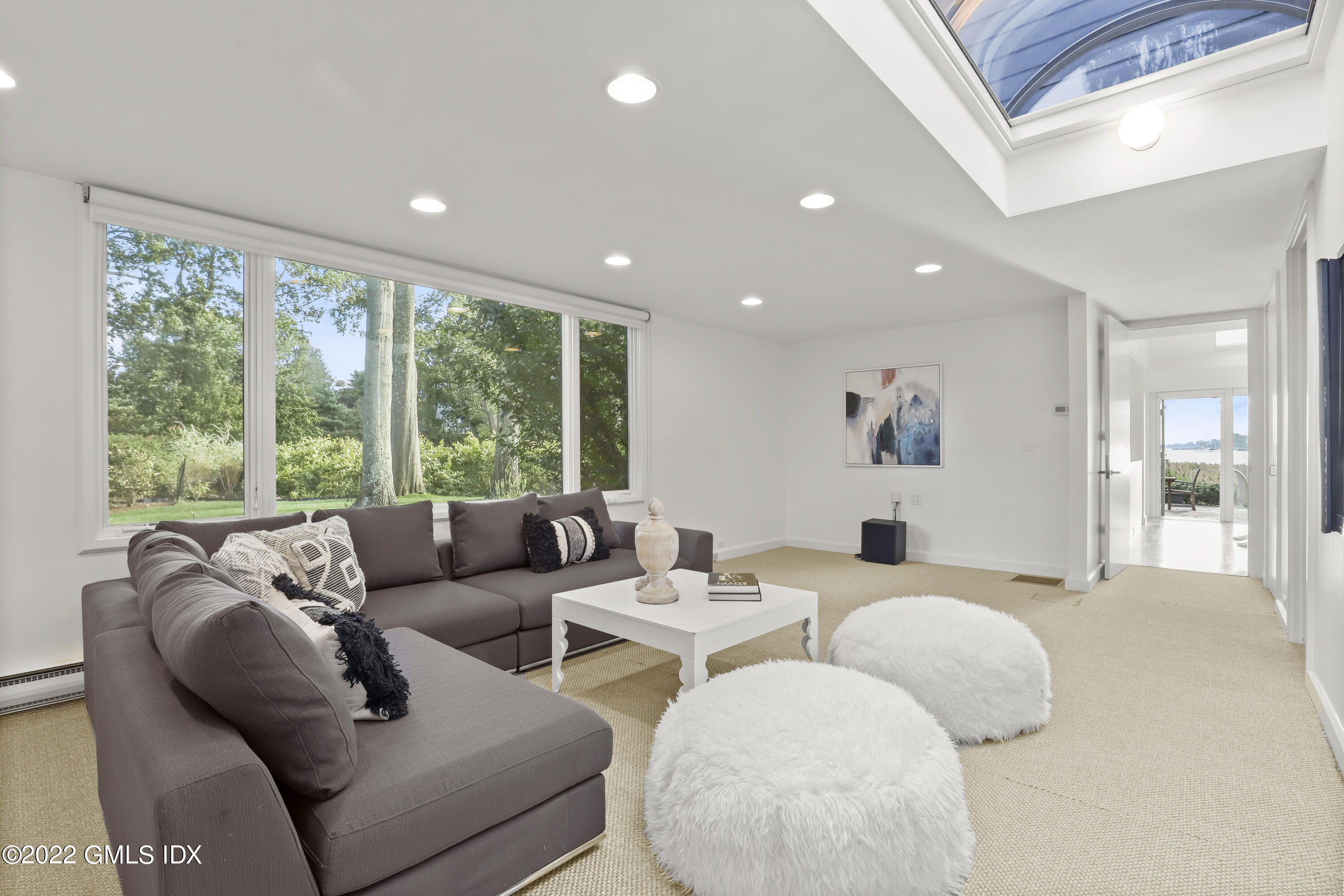 46 Carriglea Drive Riverside, CT 06878 - Photo 23 of 41 a living room with furniture and a large window