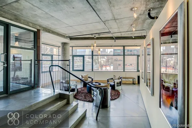 a view of a living room and entryway