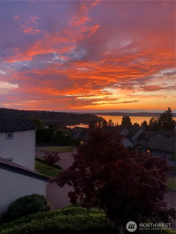 an aerial view of a house with outdoor space
