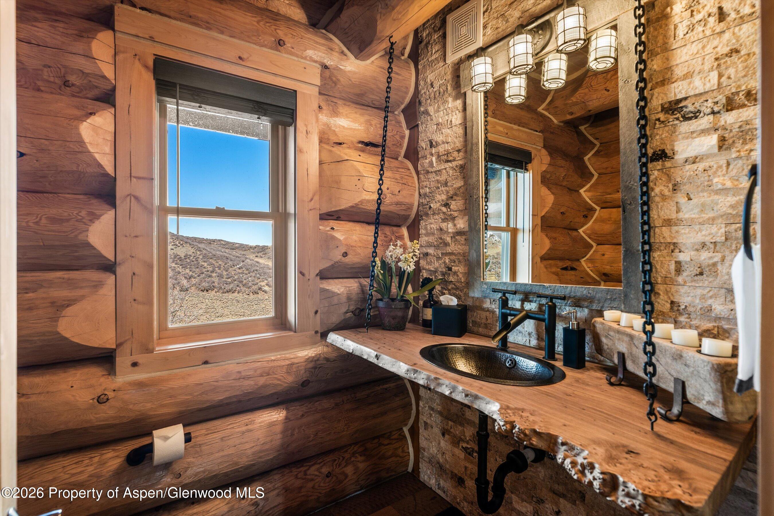 1450 Mesa Road Snowmass, CO 81654 - Photo 36 of 49 15PowderRoomMainLevel