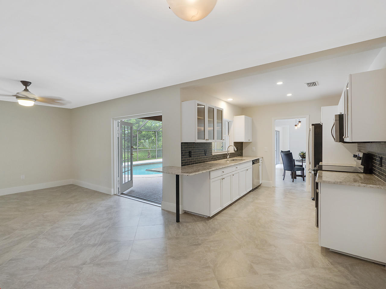 370 Northwest 11th Avenue Boca Raton, FL 33486 - Photo 8 of 21 Family Room/Kitchen