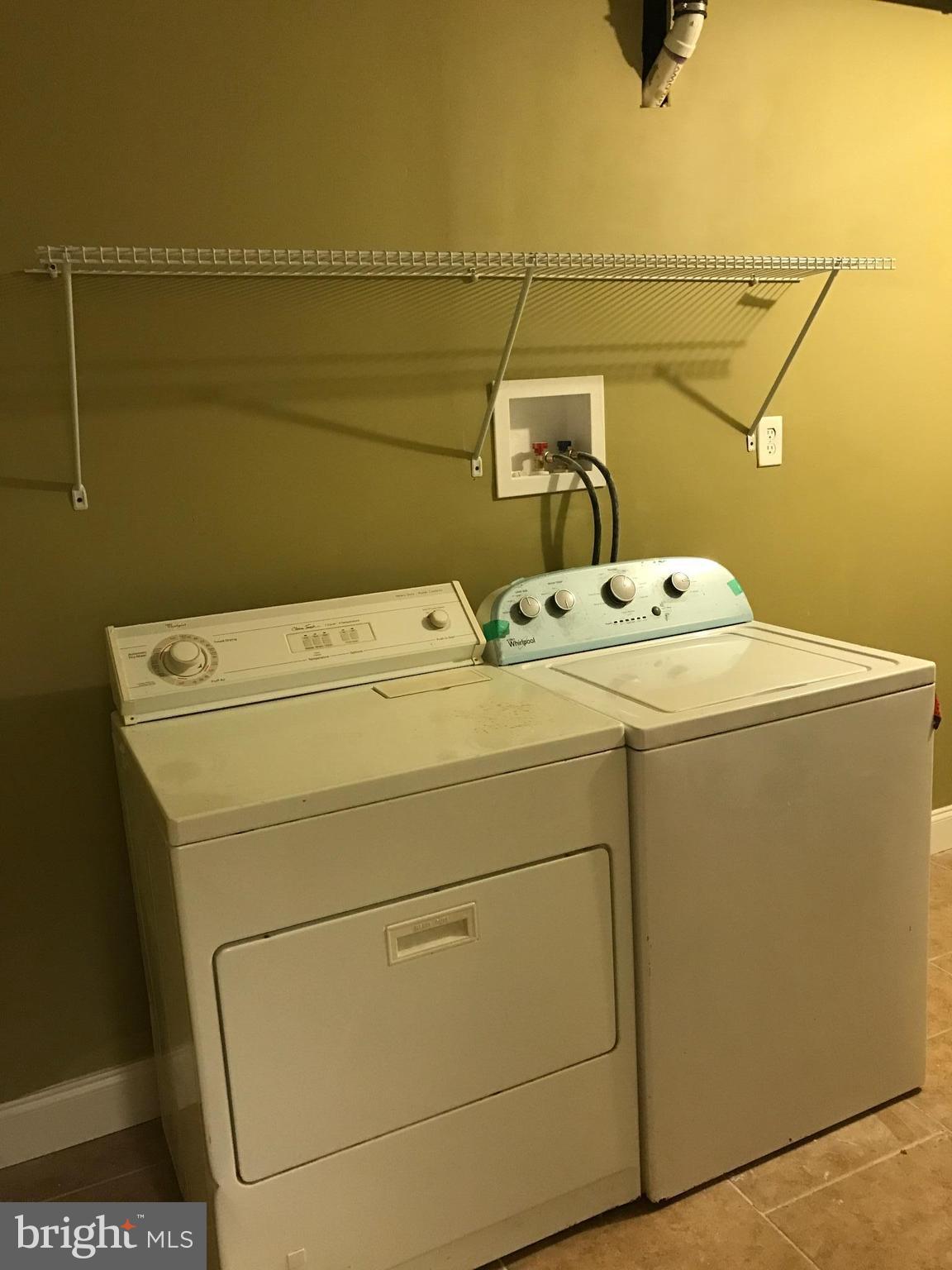 6710 Fox Meadow Road Baltimore, MD 21207 - Photo 15 of 24 a utility room with dryer and washer