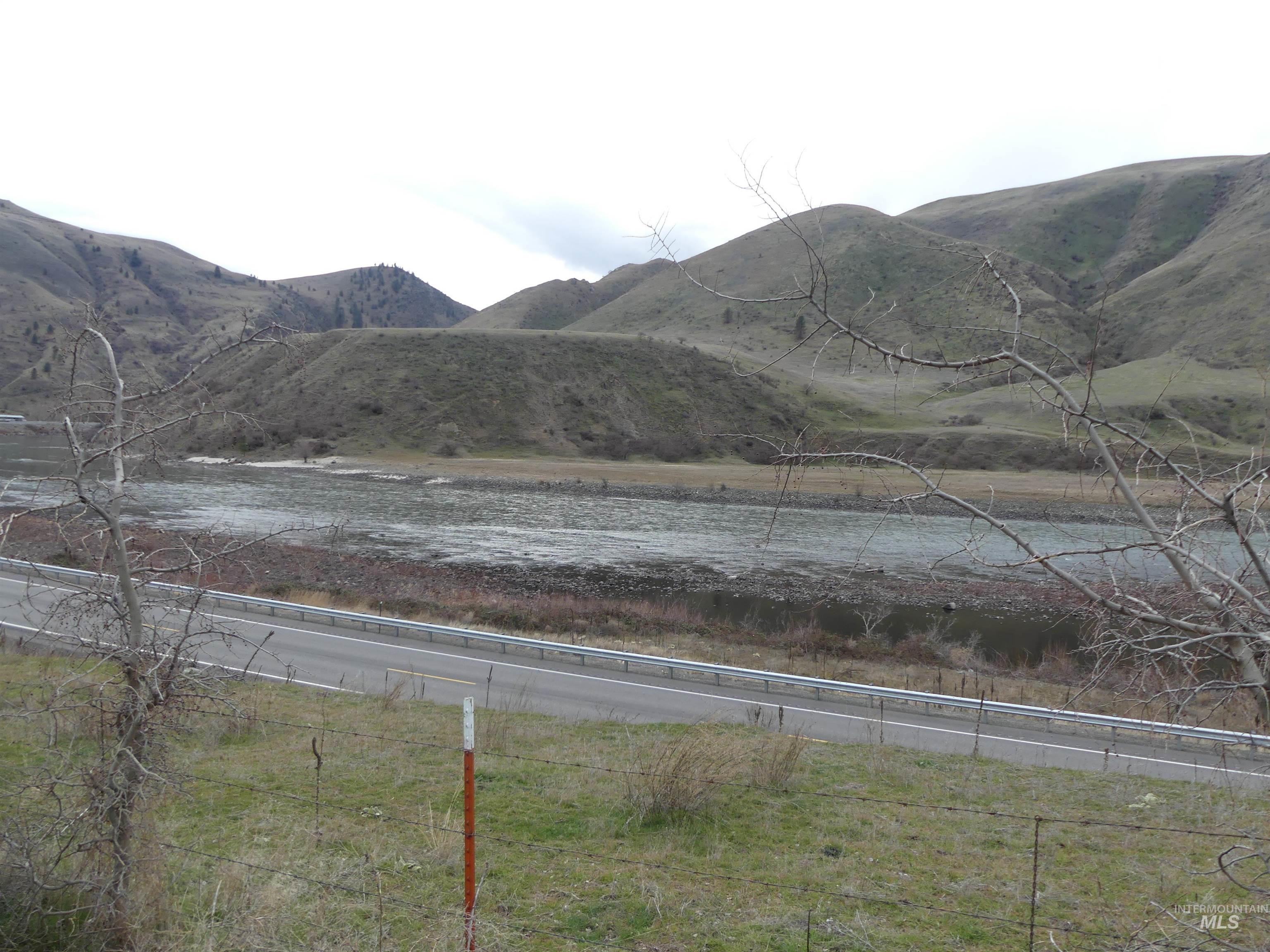 260 Slate Creek Road White Bird, ID 83554 - Photo 1 of 50 View of mountain background with rural landscape