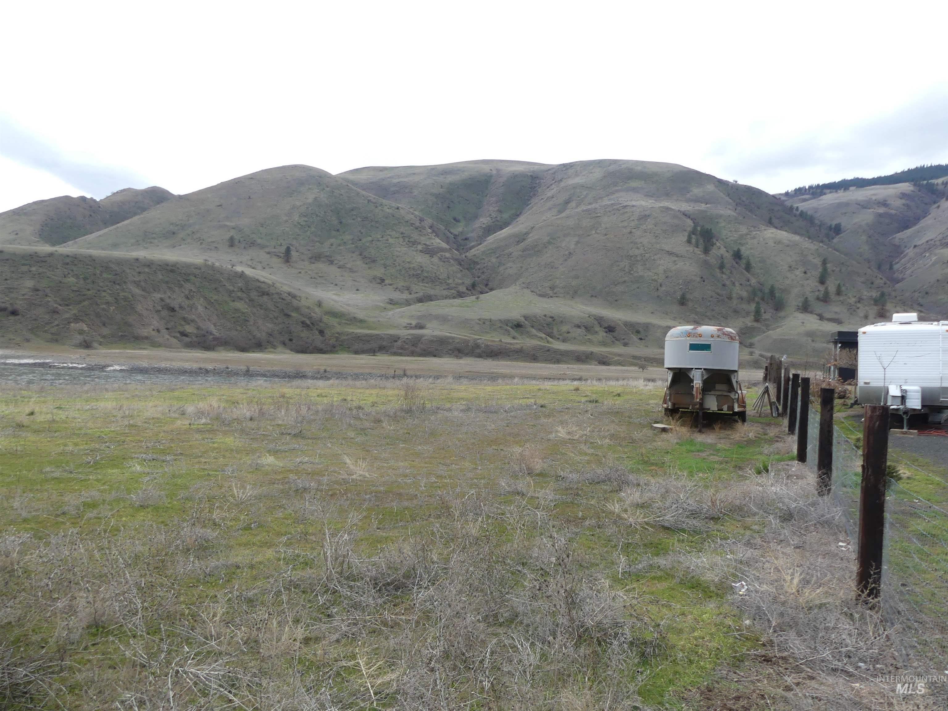 260 Slate Creek Road White Bird, ID 83554 - Photo 13 of 50 View of mountain background featuring rural landscape