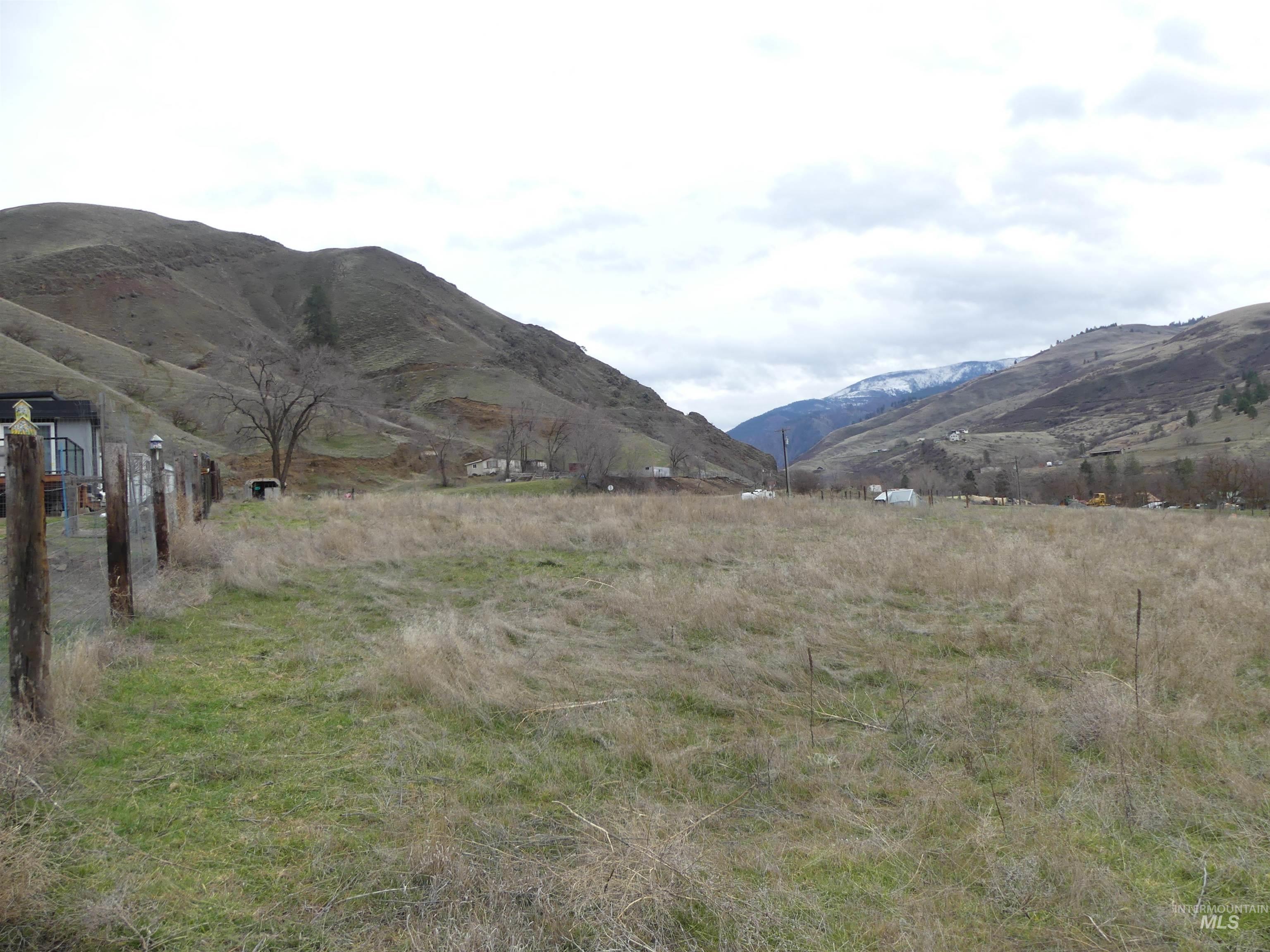 260 Slate Creek Road White Bird, ID 83554 - Photo 22 of 50 View of mountain background with rural landscape