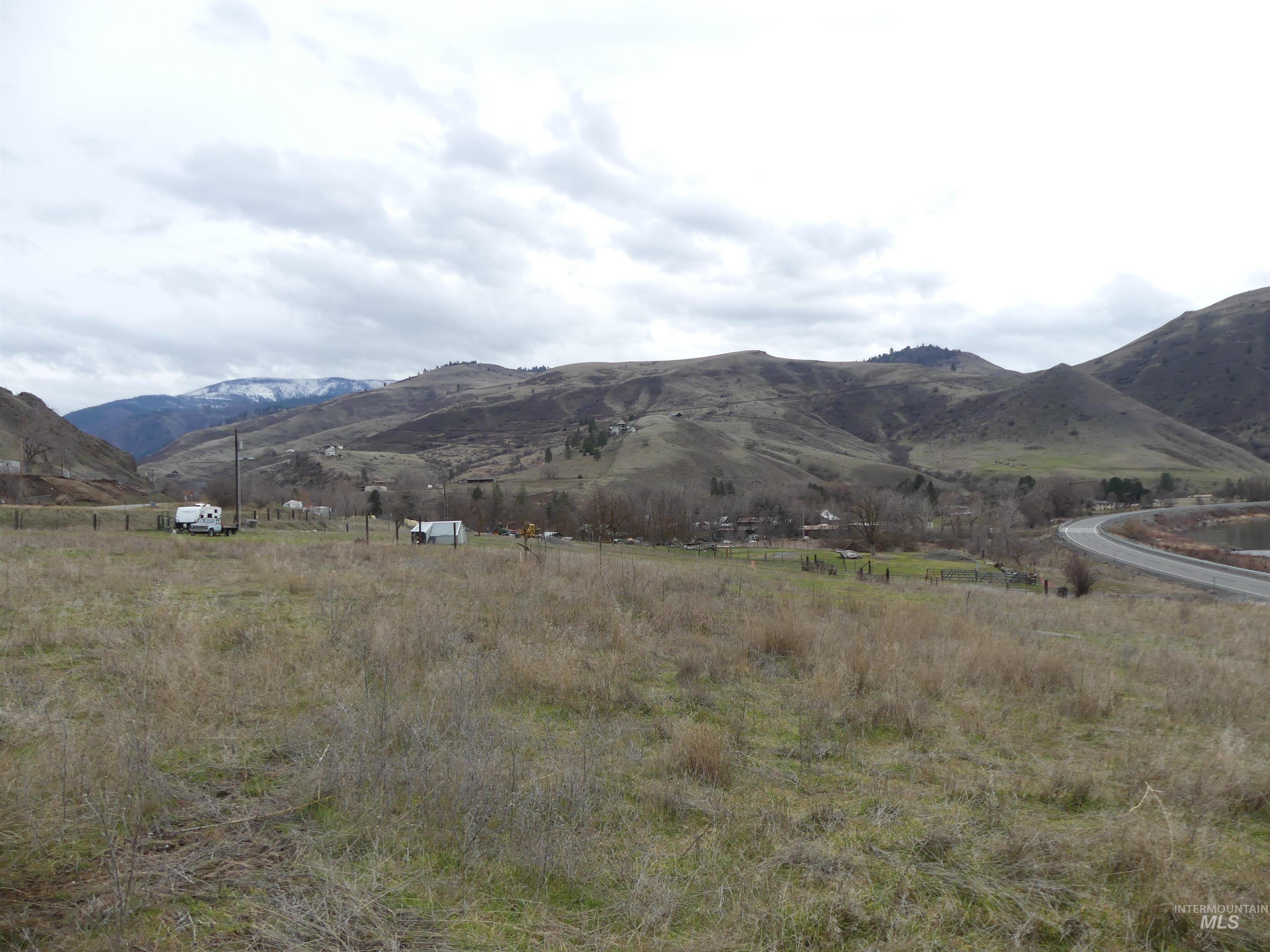 260 Slate Creek Road White Bird, ID 83554 - Photo 3 of 50 View of mountain backdrop with rural landscape