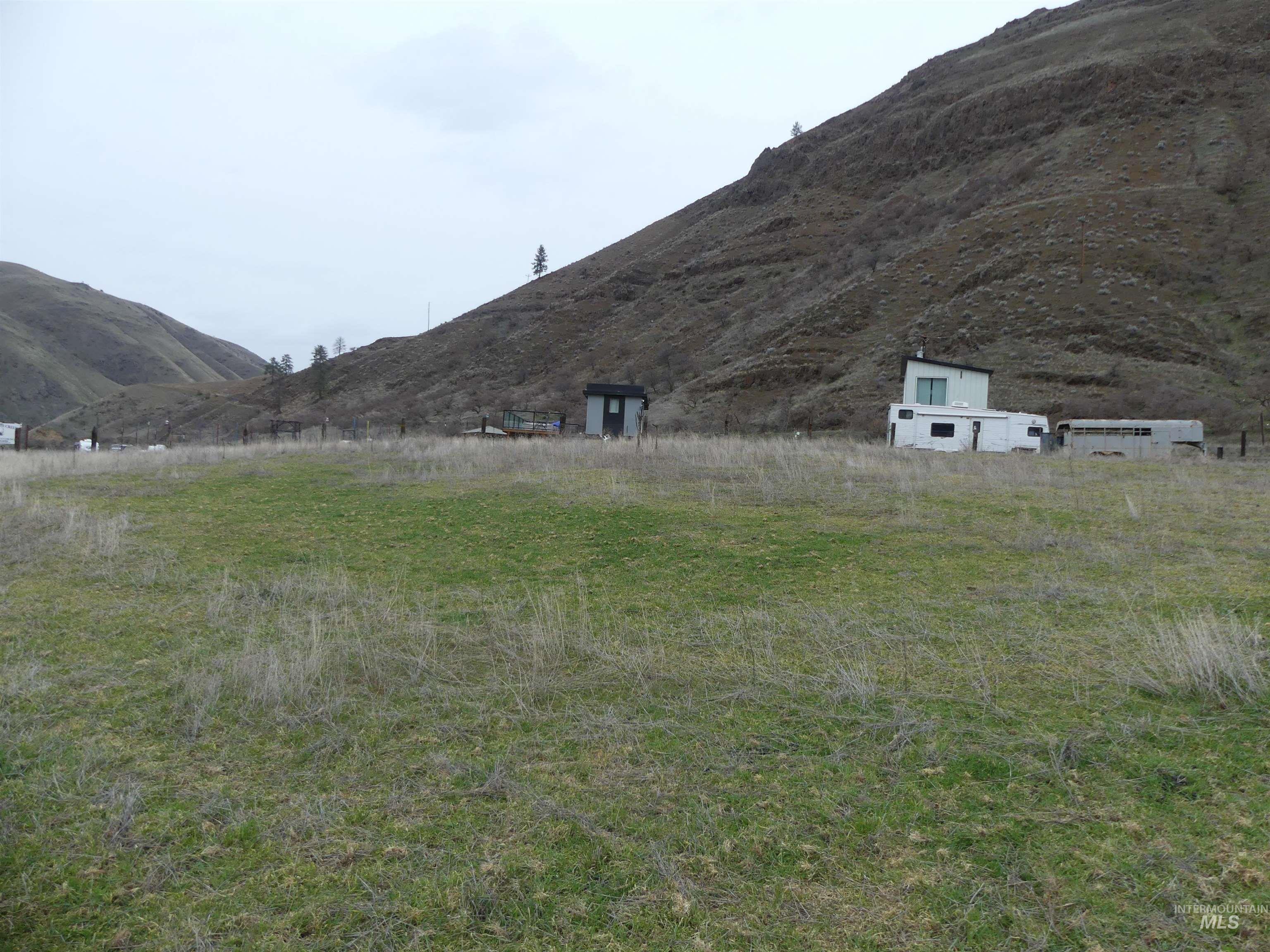 260 Slate Creek Road White Bird, ID 83554 - Photo 32 of 50 View of yard with a mountain view and a view of rural / pastoral area