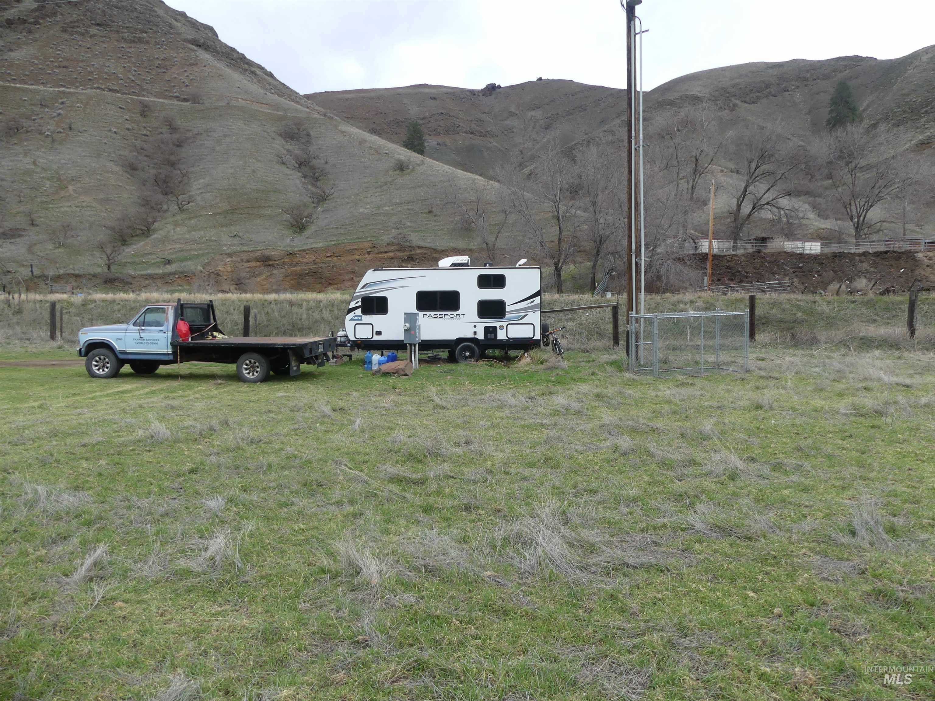 260 Slate Creek Road White Bird, ID 83554 - Photo 43 of 50 View of mountain background with rural landscape