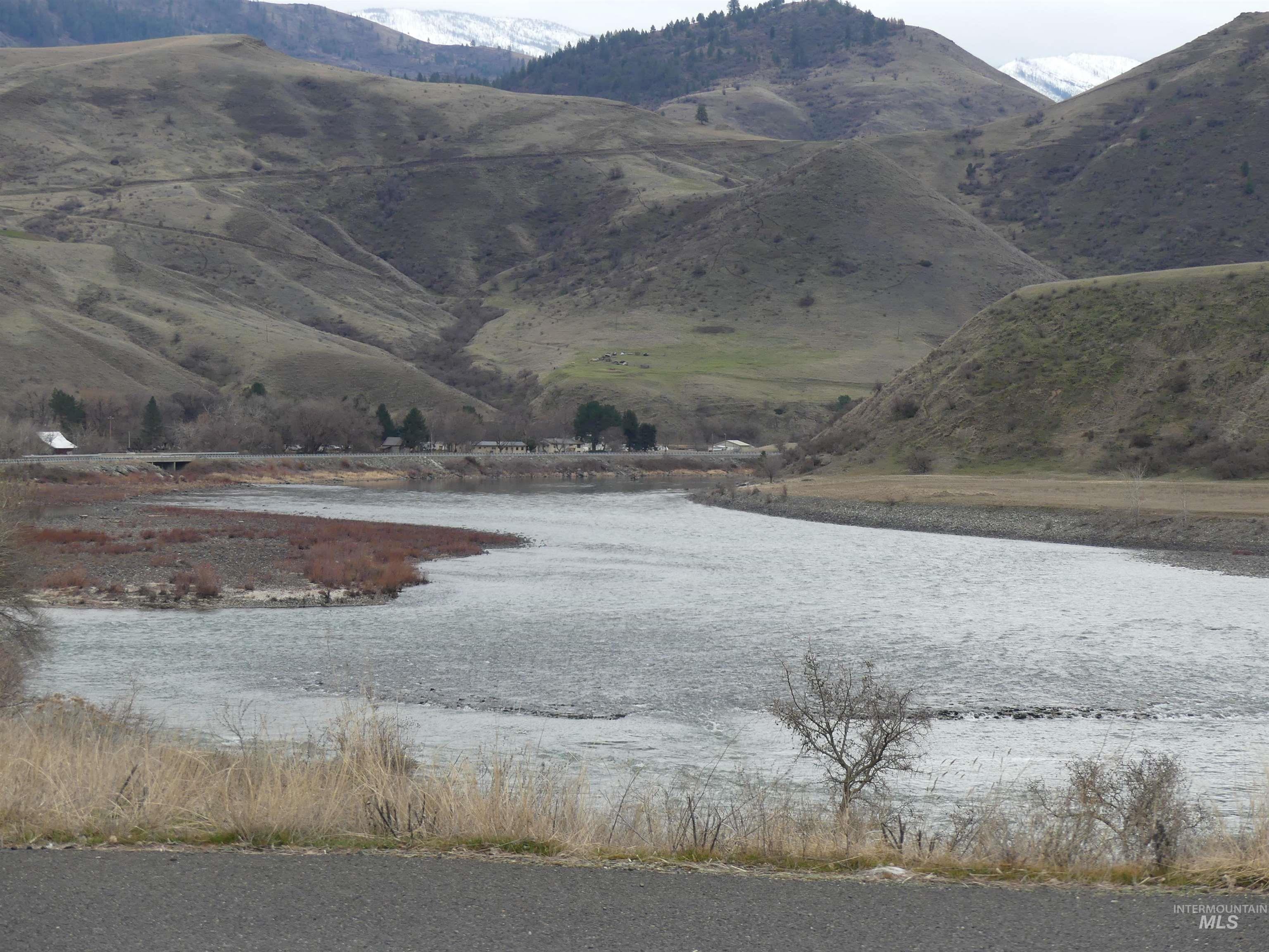260 Slate Creek Road White Bird, ID 83554 - Photo 50 of 50 View of mountain backdrop featuring a large body of water