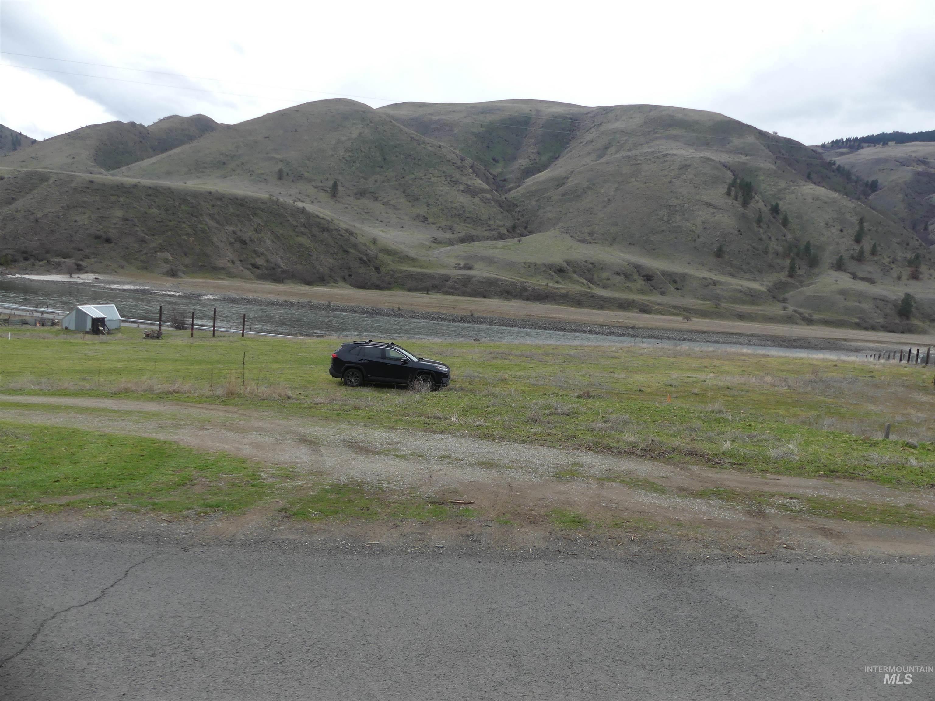 260 Slate Creek Road White Bird, ID 83554 - Photo 7 of 50 View of mountain backdrop with rural landscape