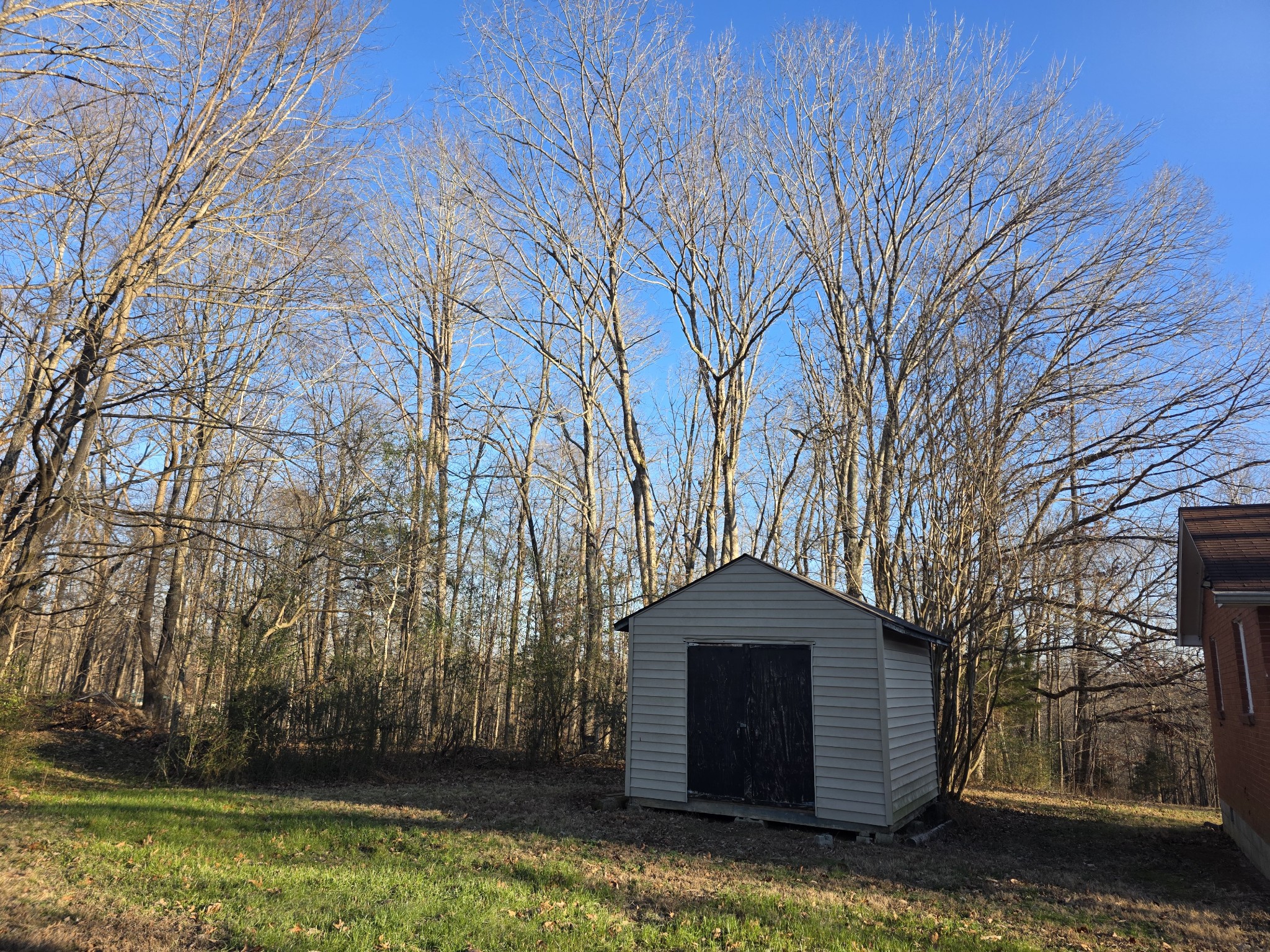 1497 Mt Pleasant Road Kingston Springs, TN 37082 - Photo 25 of 25 a front view of a house with a yard