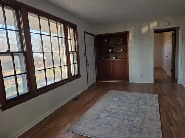 a view of an empty room with a window