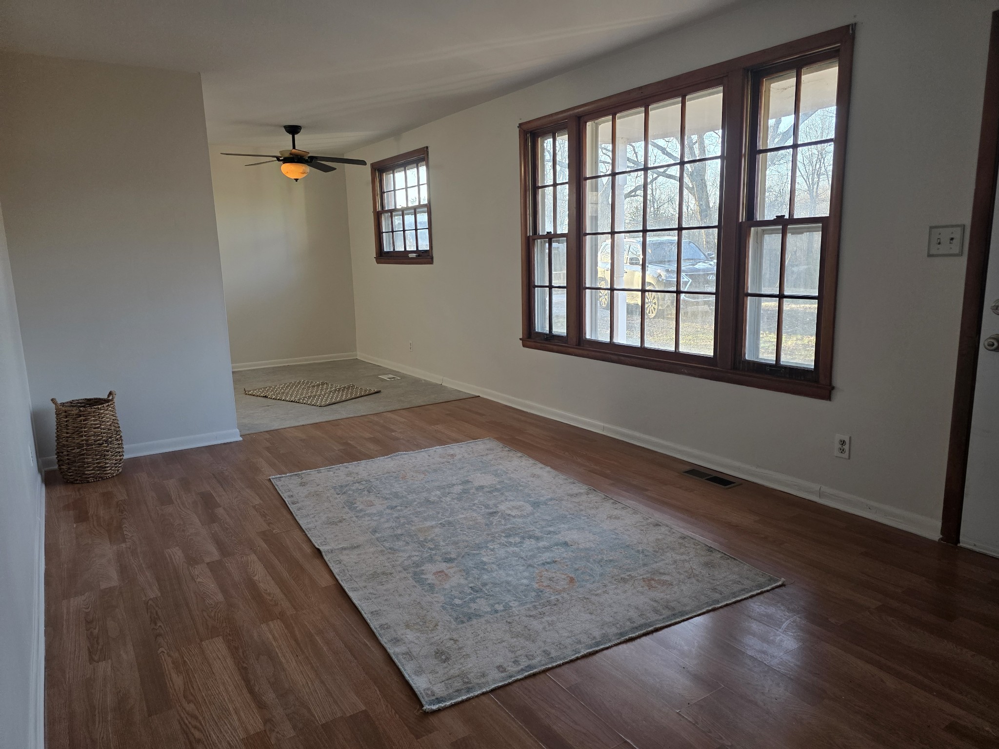 1497 Mt Pleasant Road Kingston Springs, TN 37082 - Photo 6 of 25 an empty room with wooden floor and windows