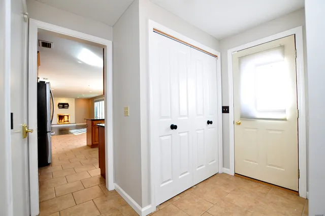 a view of a livingroom from a hallway