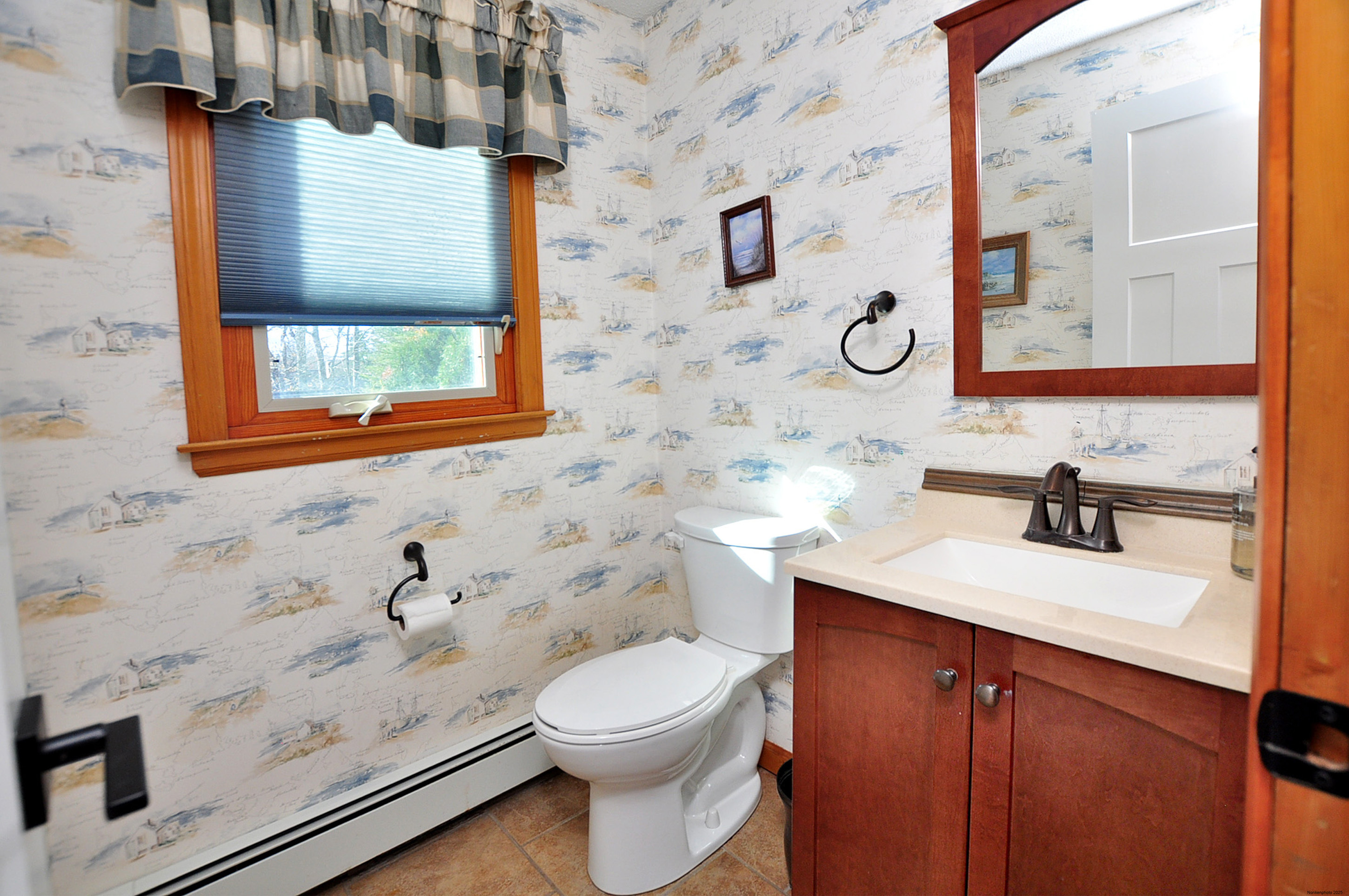 16 Virginia Lane Farmington, CT 06085 - Photo 19 of 40 a bathroom with a granite countertop toilet sink and mirror
