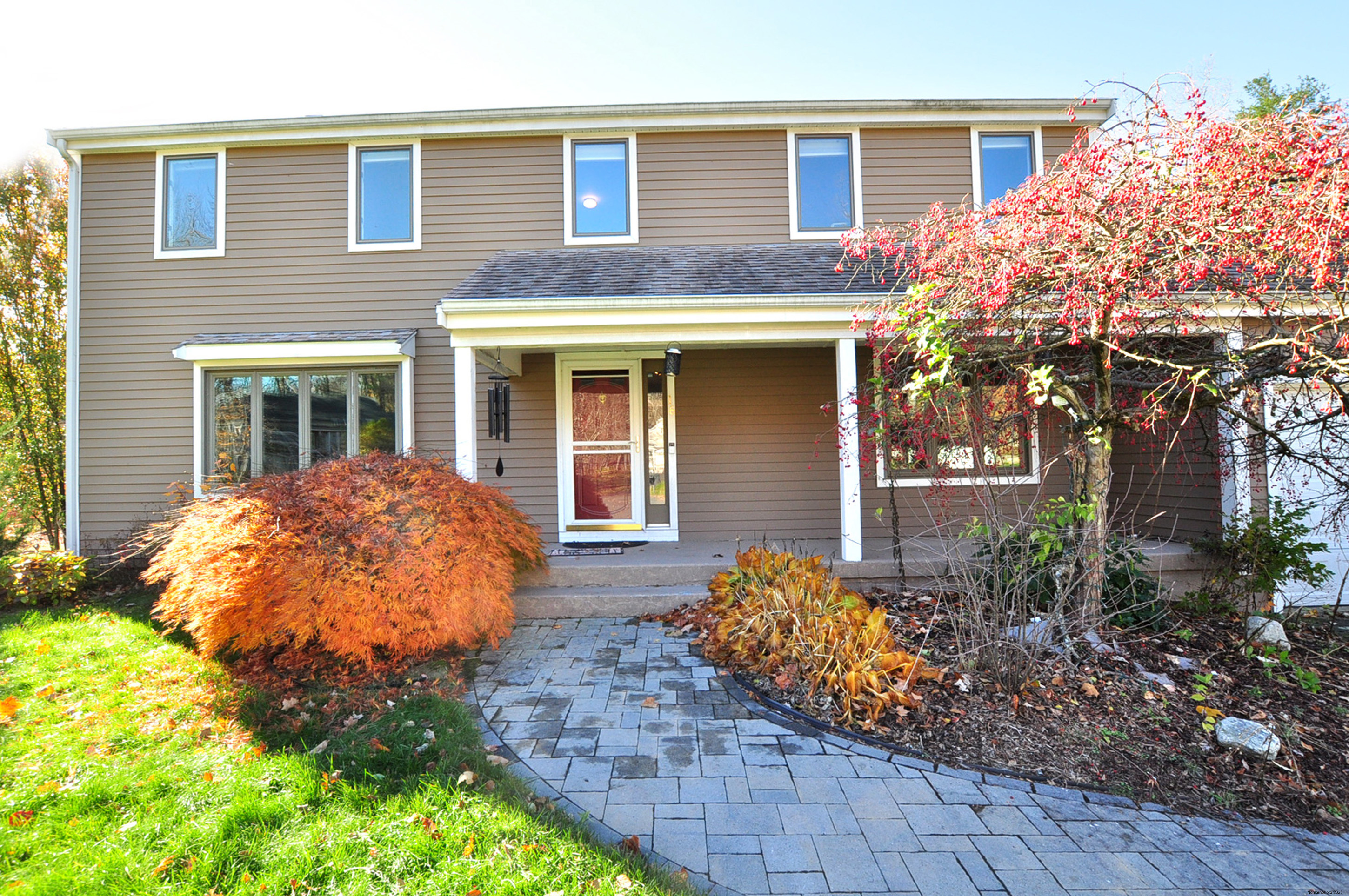 16 Virginia Lane Farmington, CT 06085 - Photo 2 of 40 a front view of a house with garden