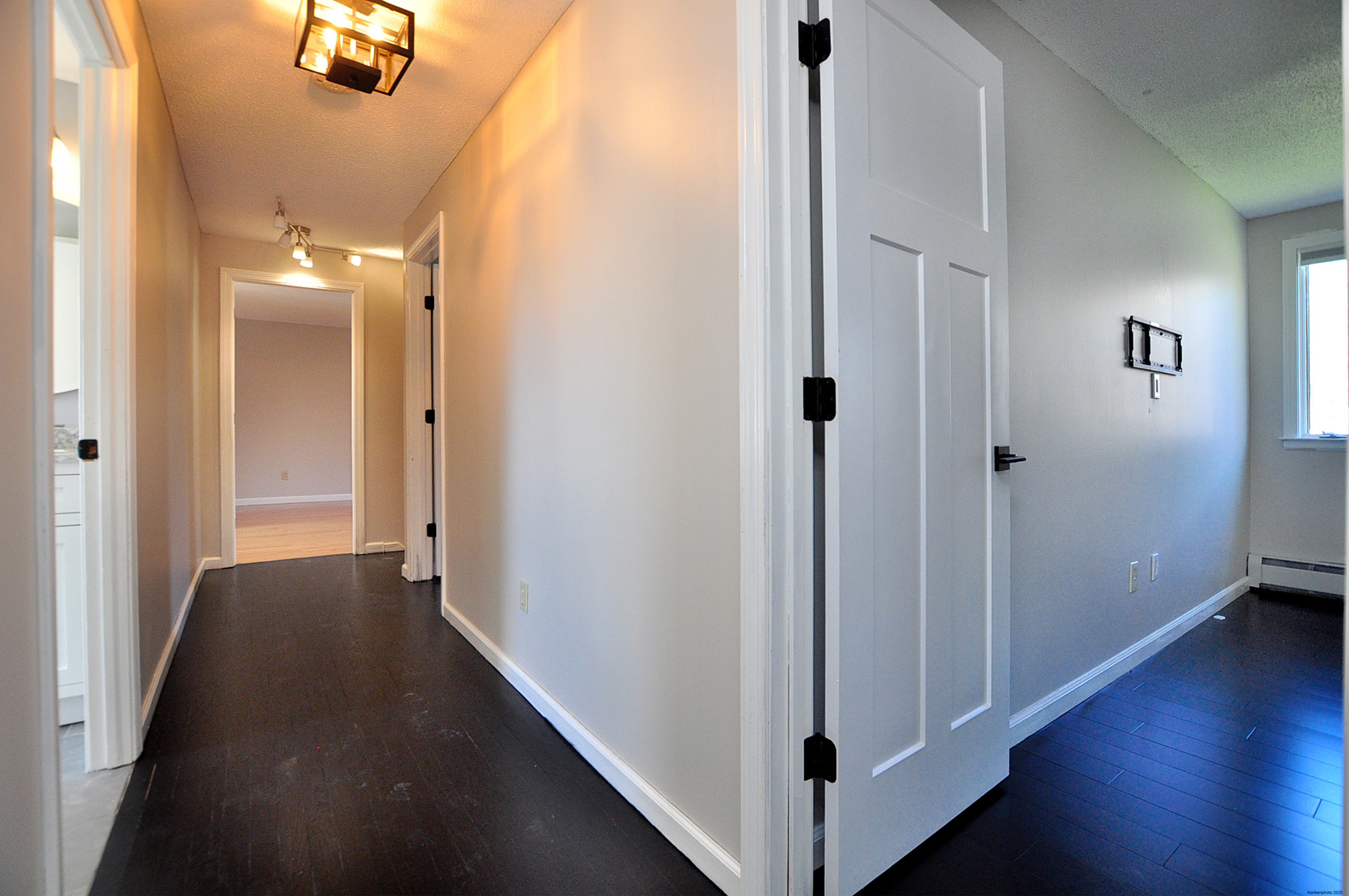 16 Virginia Lane Farmington, CT 06085 - Photo 36 of 40 a view of a hallway with wooden floor
