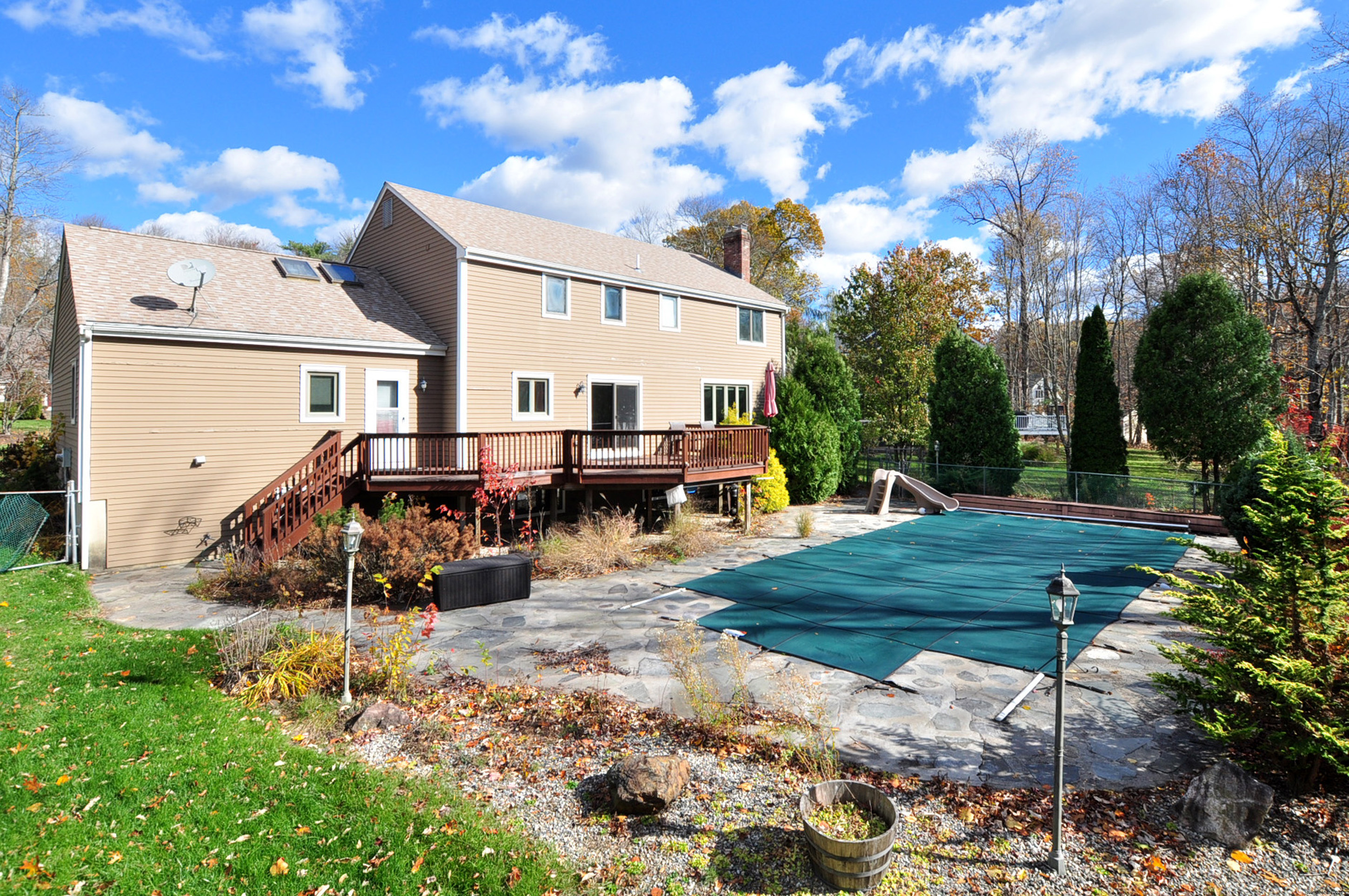 16 Virginia Lane Farmington, CT 06085 - Photo 38 of 40 a view of a backyard with sitting area