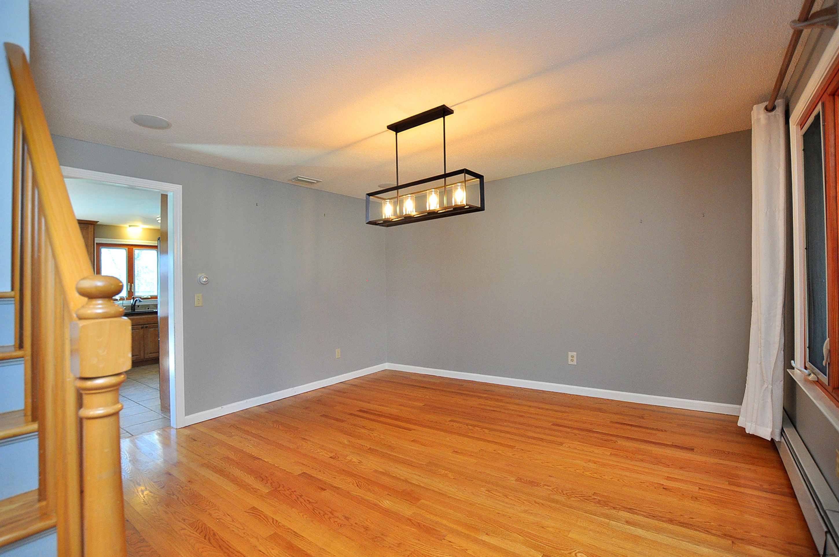 16 Virginia Lane Farmington, CT 06085 - Photo 6 of 40 wooden floor in an empty room with a window