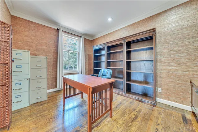 a room with furniture and wooden floor