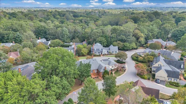 an aerial view of multiple house with outdoor space