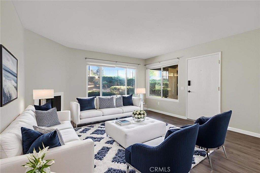 2891 Canyon Crest, Unit 32 Riverside, CA 92507 - Photo 5 of 27 a living room with furniture and a window