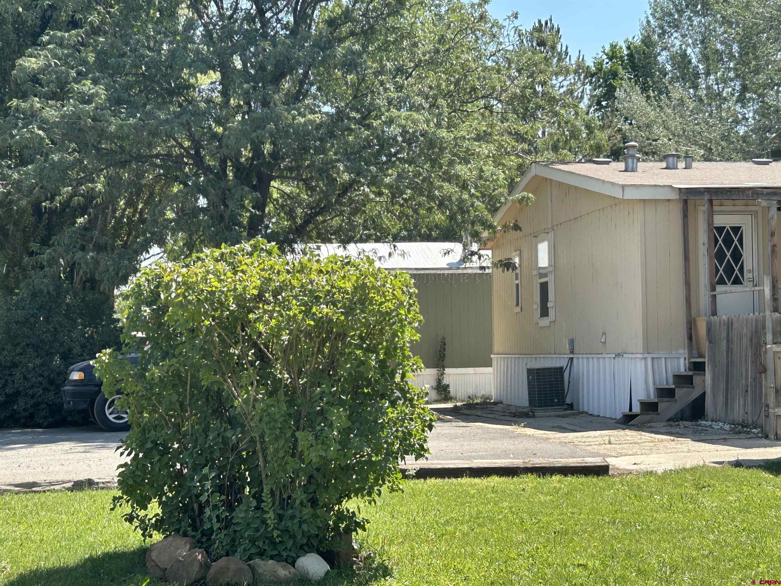 28260 Highway 160, Unit 1 Cortez, CO 81321 - Photo 17 of 21 a view of a back yard of the house