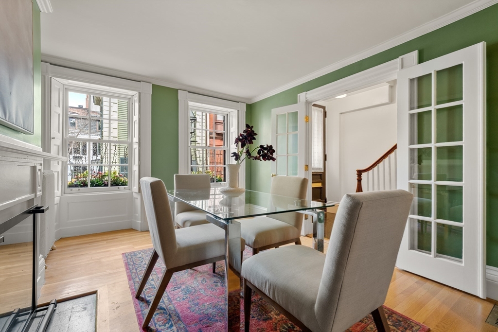 14 Pinckney Street Boston, MA 02114 - Photo 4 of 27 a dining room with furniture window and wooden floor
