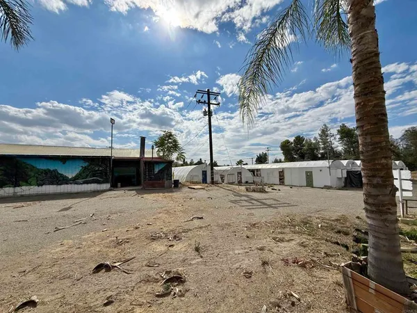a view of a backyard of the house