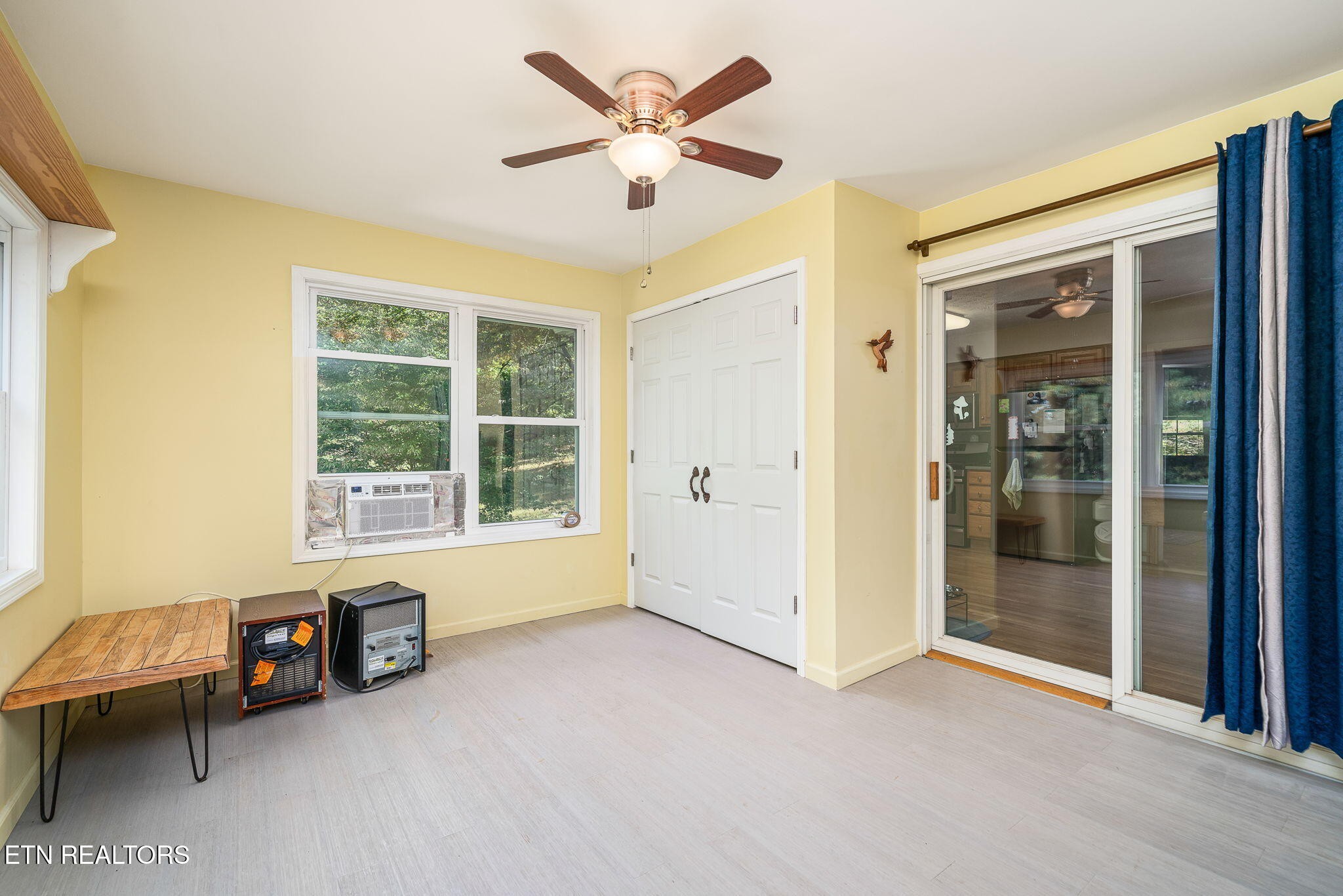 614 West Creston Road Crossville, TN 38571 - Photo 13 of 47 a view of a livingroom with a window and a kitchen