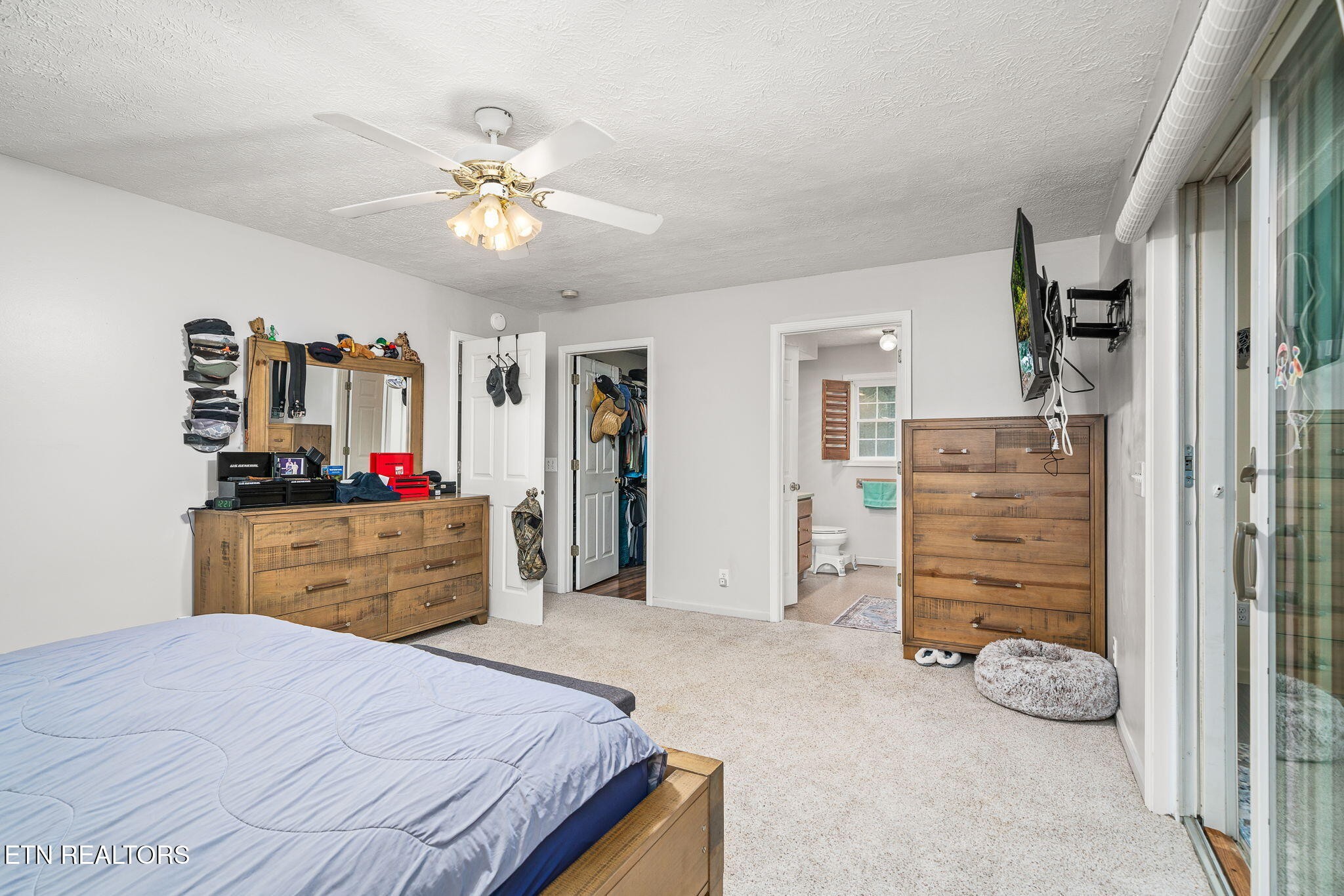 614 West Creston Road Crossville, TN 38571 - Photo 16 of 47 a bedroom with a bed and a dresser