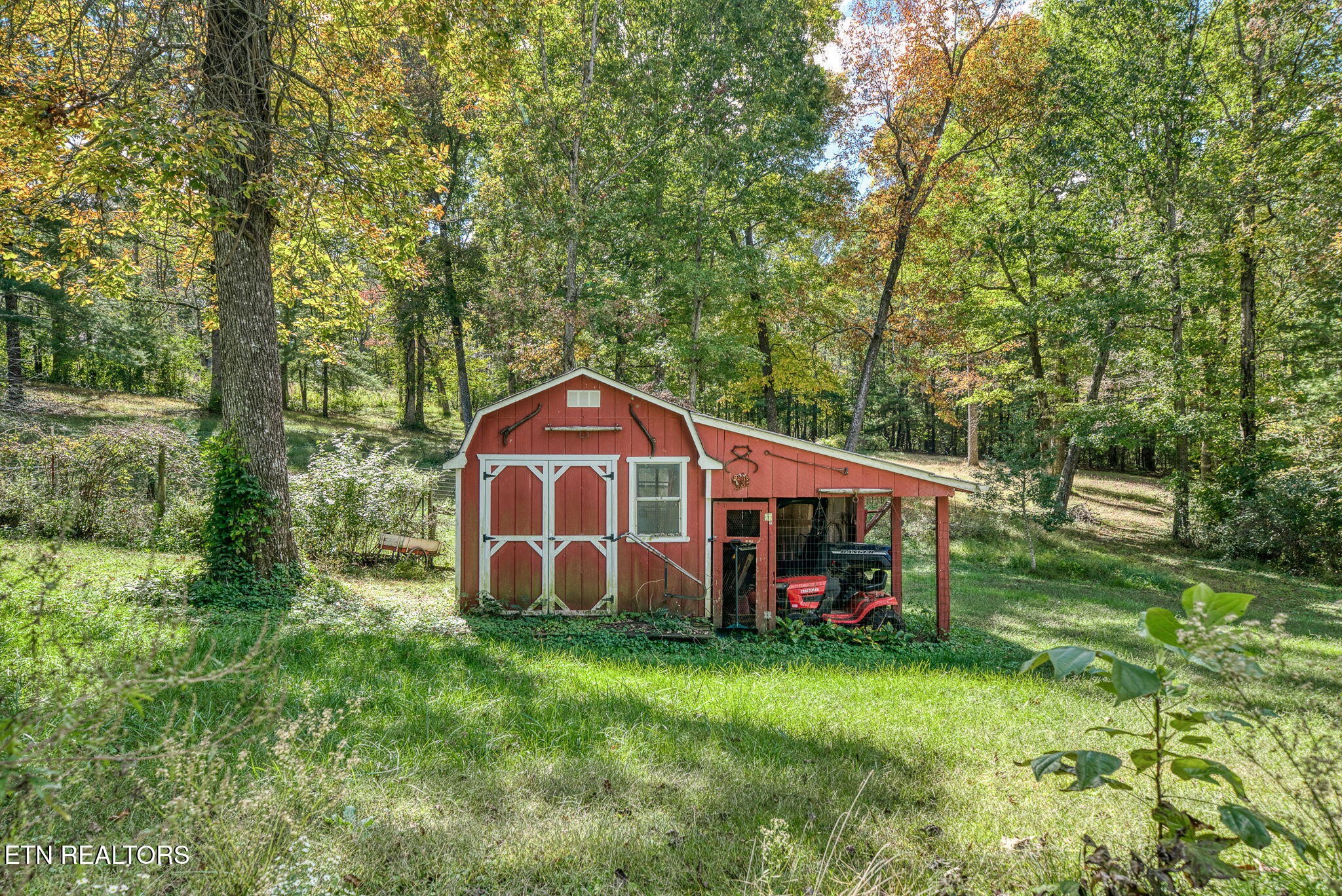614 West Creston Road Crossville, TN 38571 - Photo 29 of 47 a view of a tiny house with yard and sitting area
