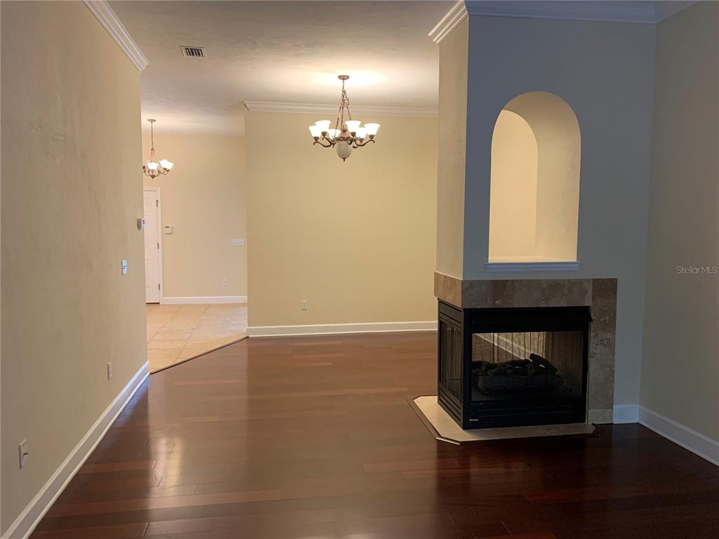 187 Southwest 129 Terrace Newberry, FL 32669 - Photo 16 of 39 a room with a fireplace