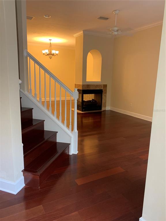 187 Southwest 129 Terrace Newberry, FL 32669 - Photo 3 of 39 a view of entryway and hall with wooden floor