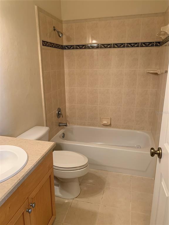 187 Southwest 129 Terrace Newberry, FL 32669 - Photo 32 of 39 a bathroom with a shower a sink and a toilet
