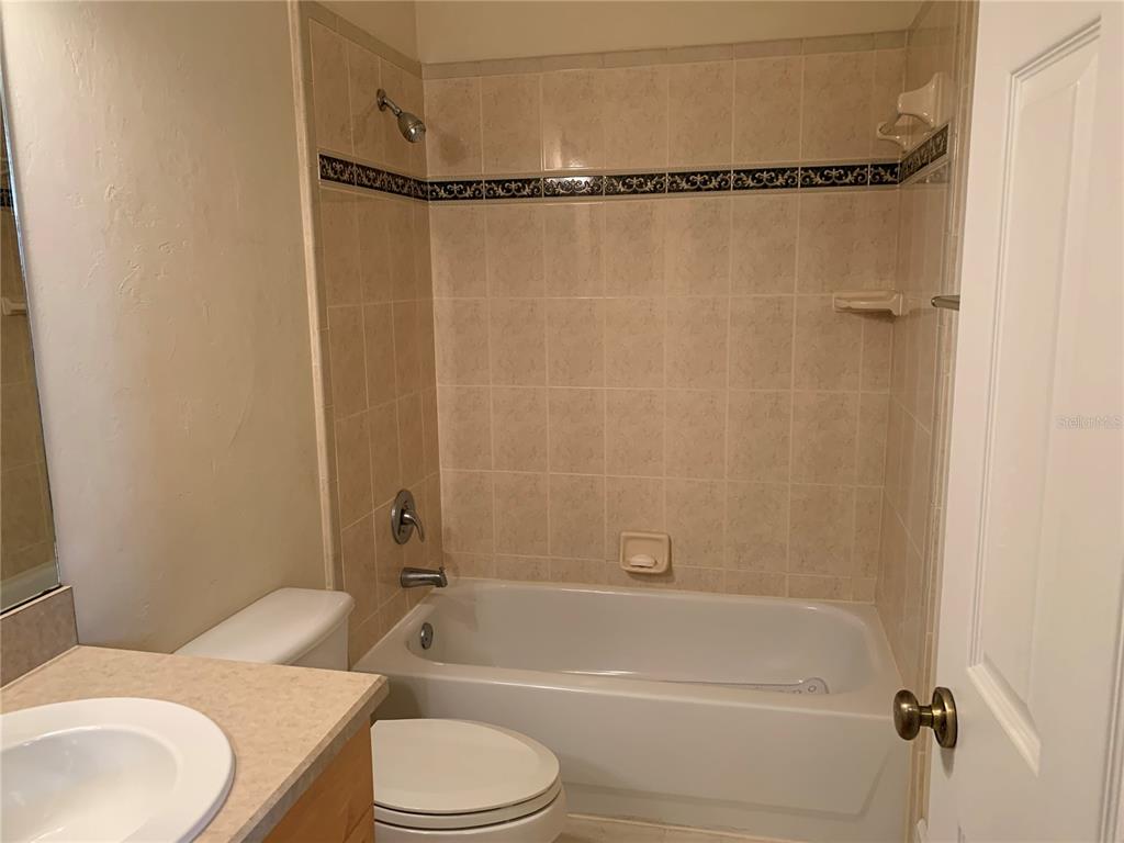 187 Southwest 129 Terrace Newberry, FL 32669 - Photo 33 of 39 a bathroom with a toilet and shower