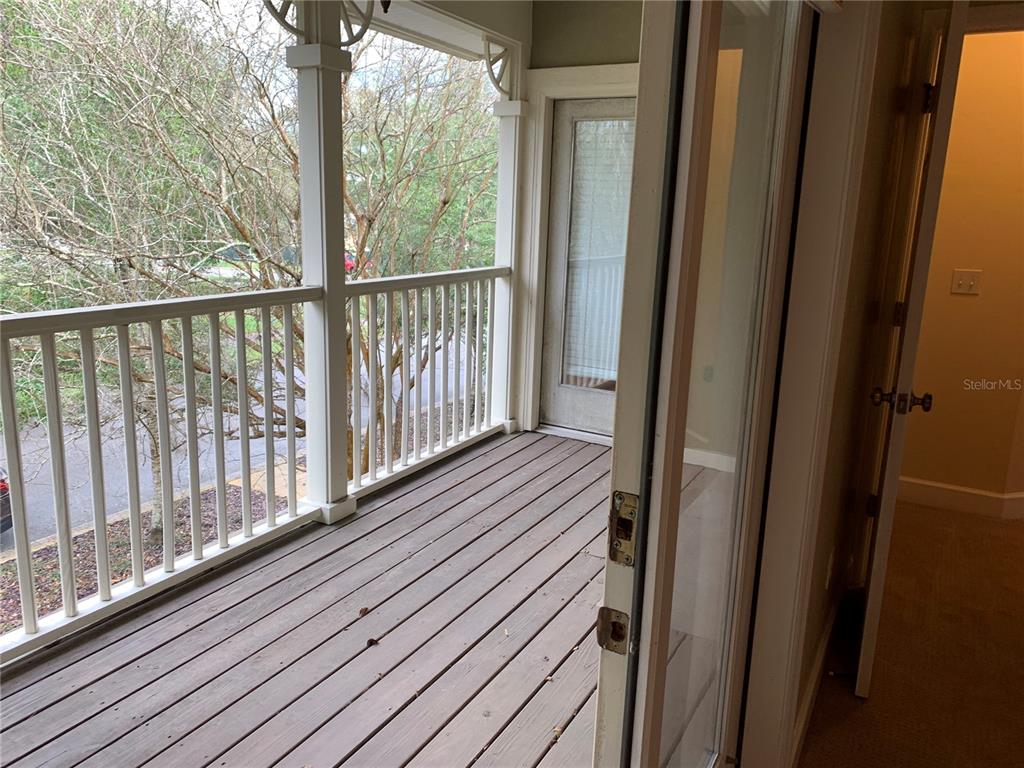 187 Southwest 129 Terrace Newberry, FL 32669 - Photo 38 of 39 a view of a balcony with wooden floor