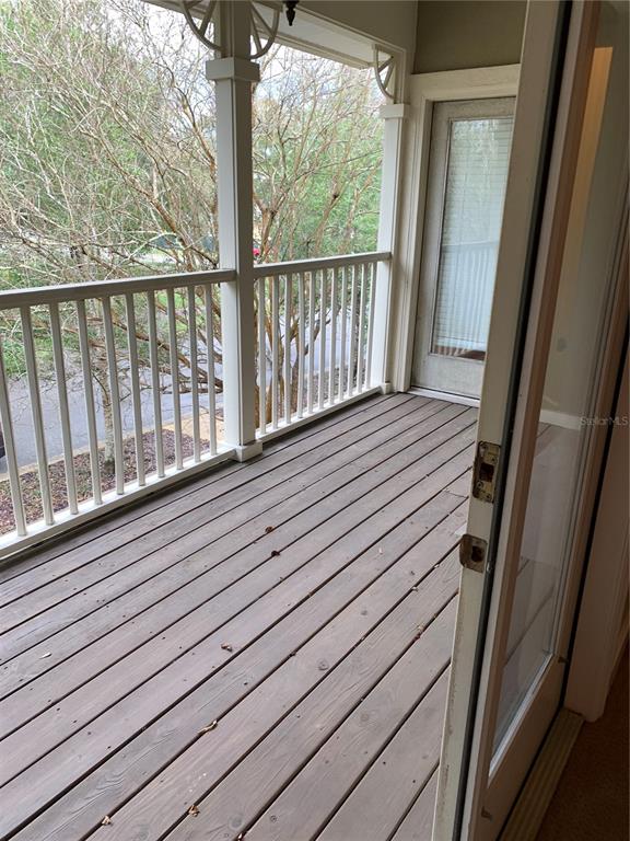187 Southwest 129 Terrace Newberry, FL 32669 - Photo 39 of 39 a view of balcony with wooden floor